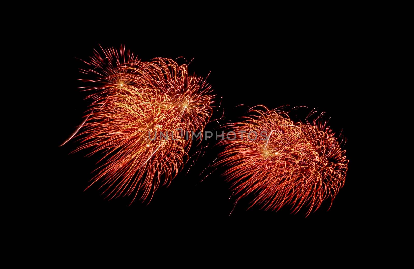 Red exploded fireworks display, isolated on black background