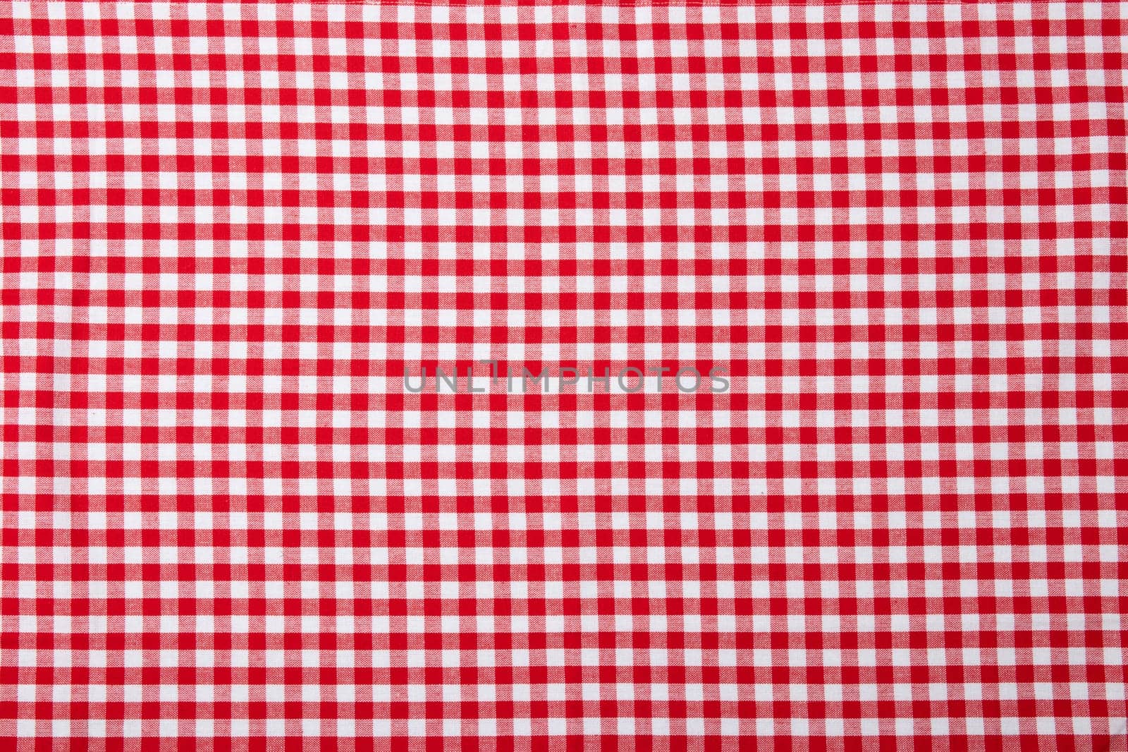Red and white checkered napkin. Kitchen accessories.