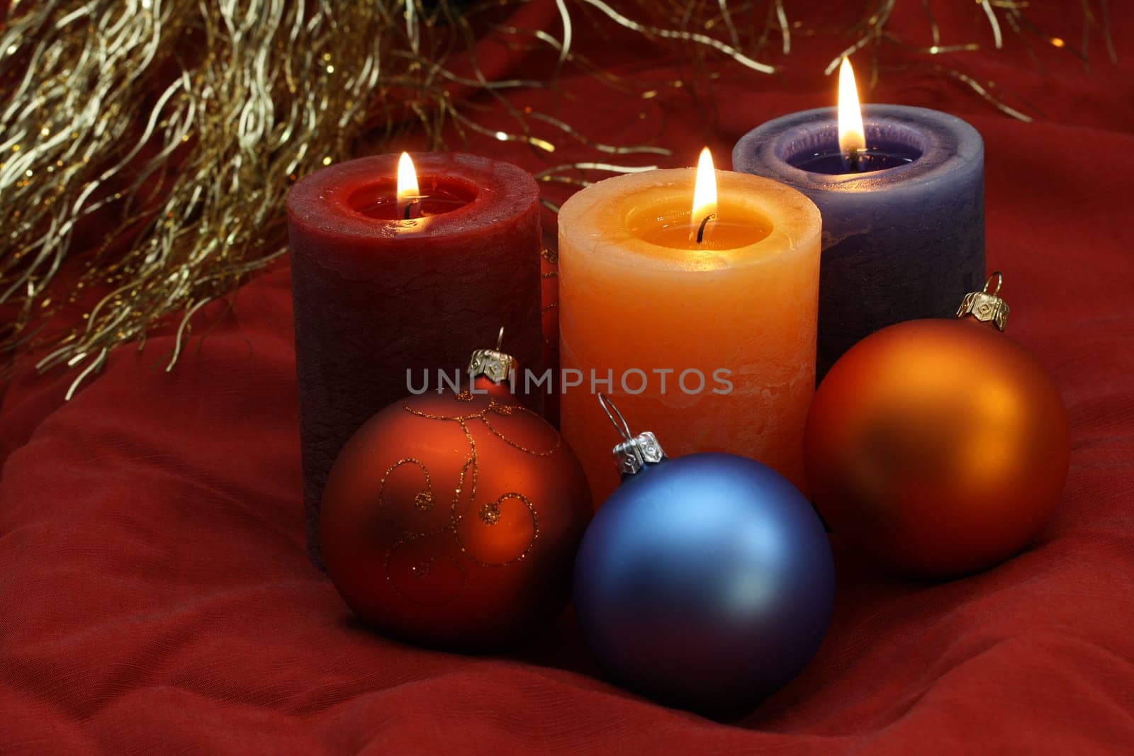 Christmas: three coloured candles