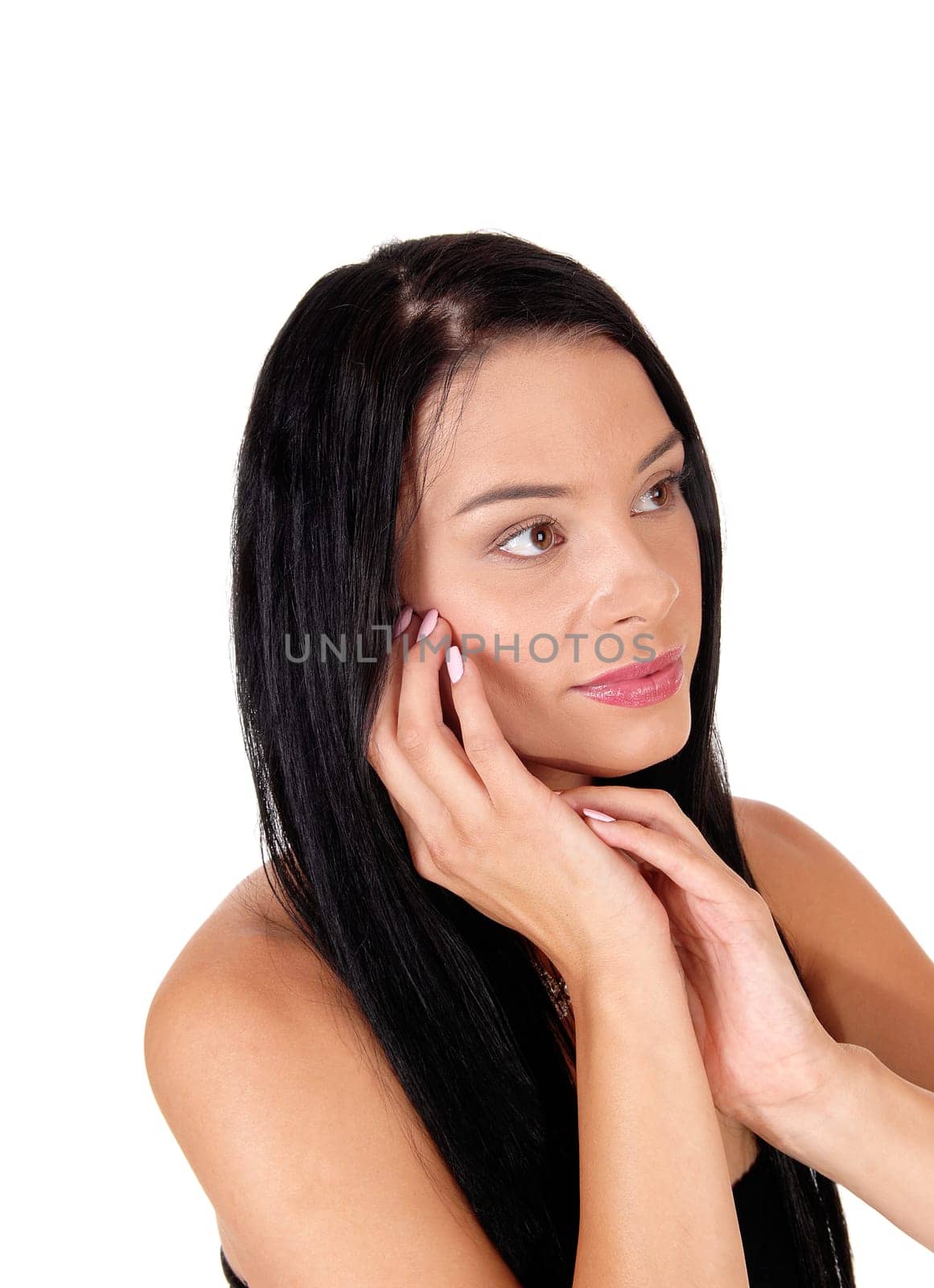 A closeup image of a beautiful woman, dreaming and with her hands.on her face and long back hair, isolated for white background.