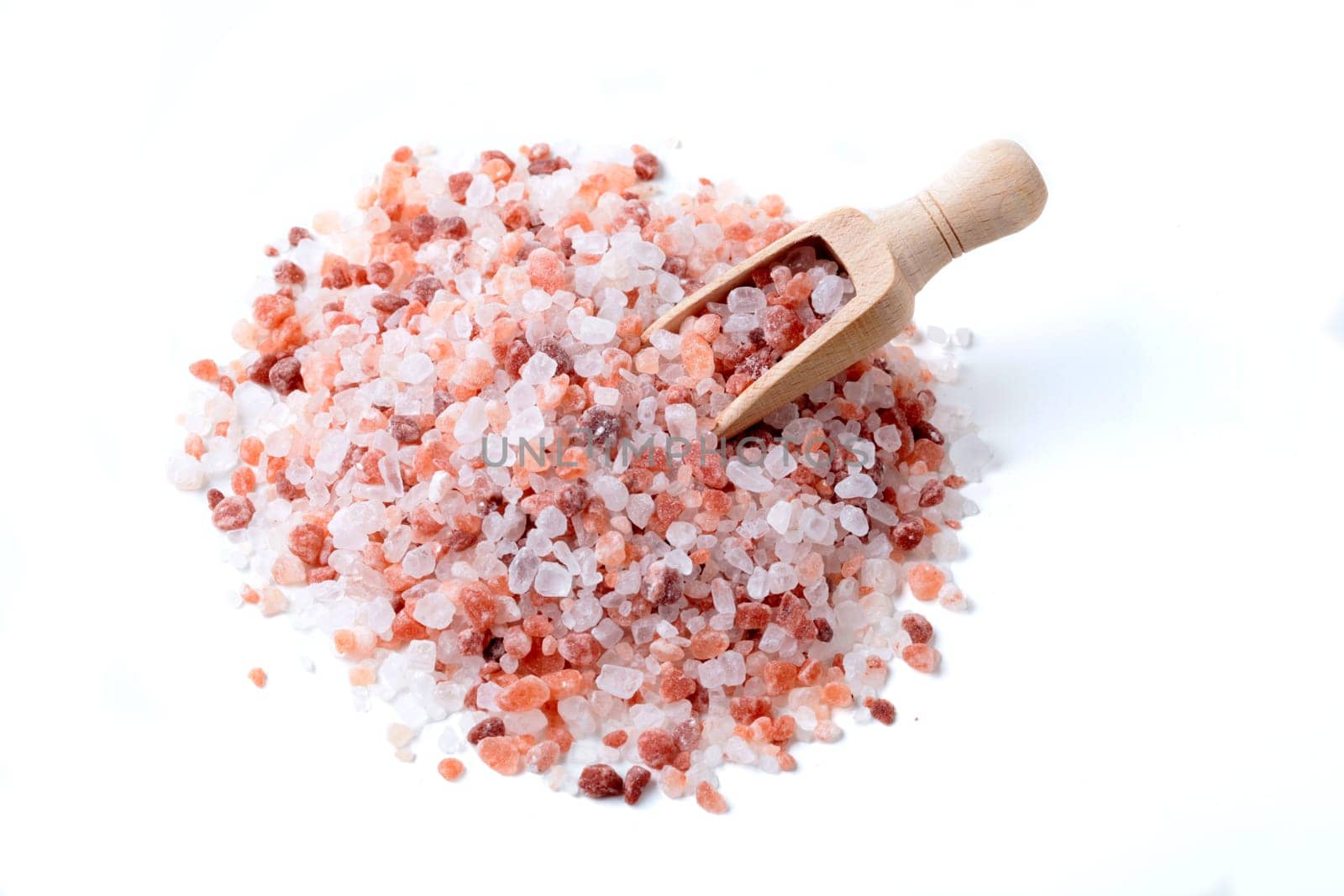 Wood Spoon in a Pile of Himalaya Salt Isolated on White Background
