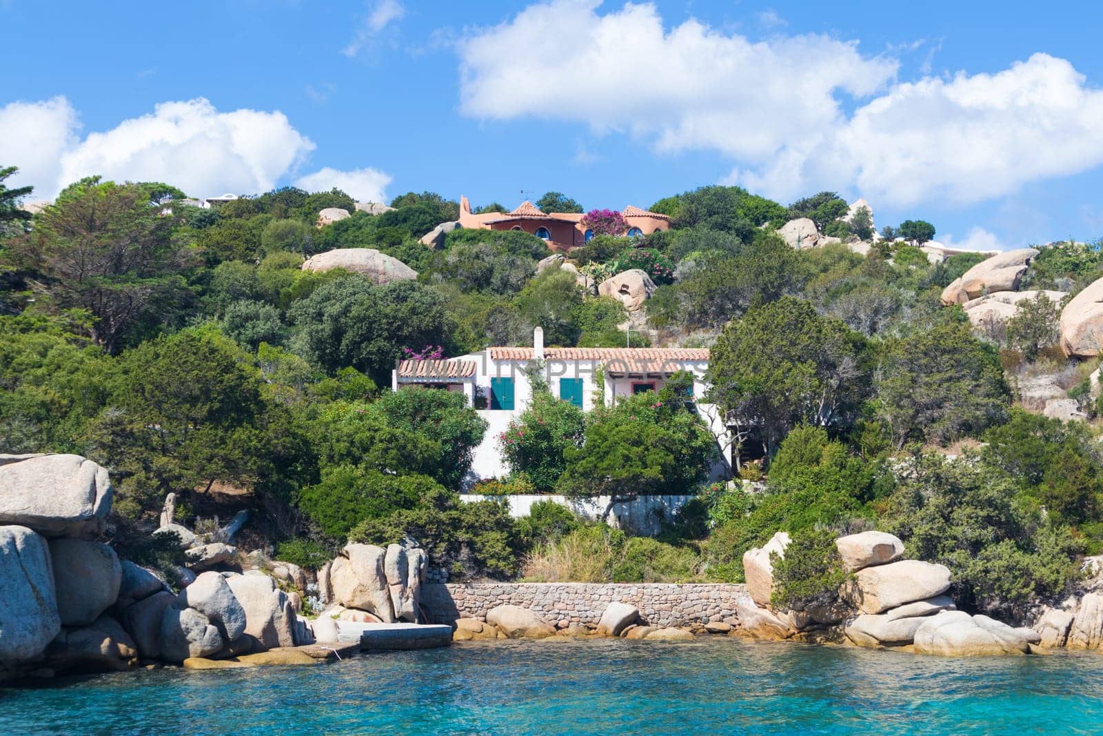 Summer sea house in beautiful village of Port Rafael, Sardinia, Italy.