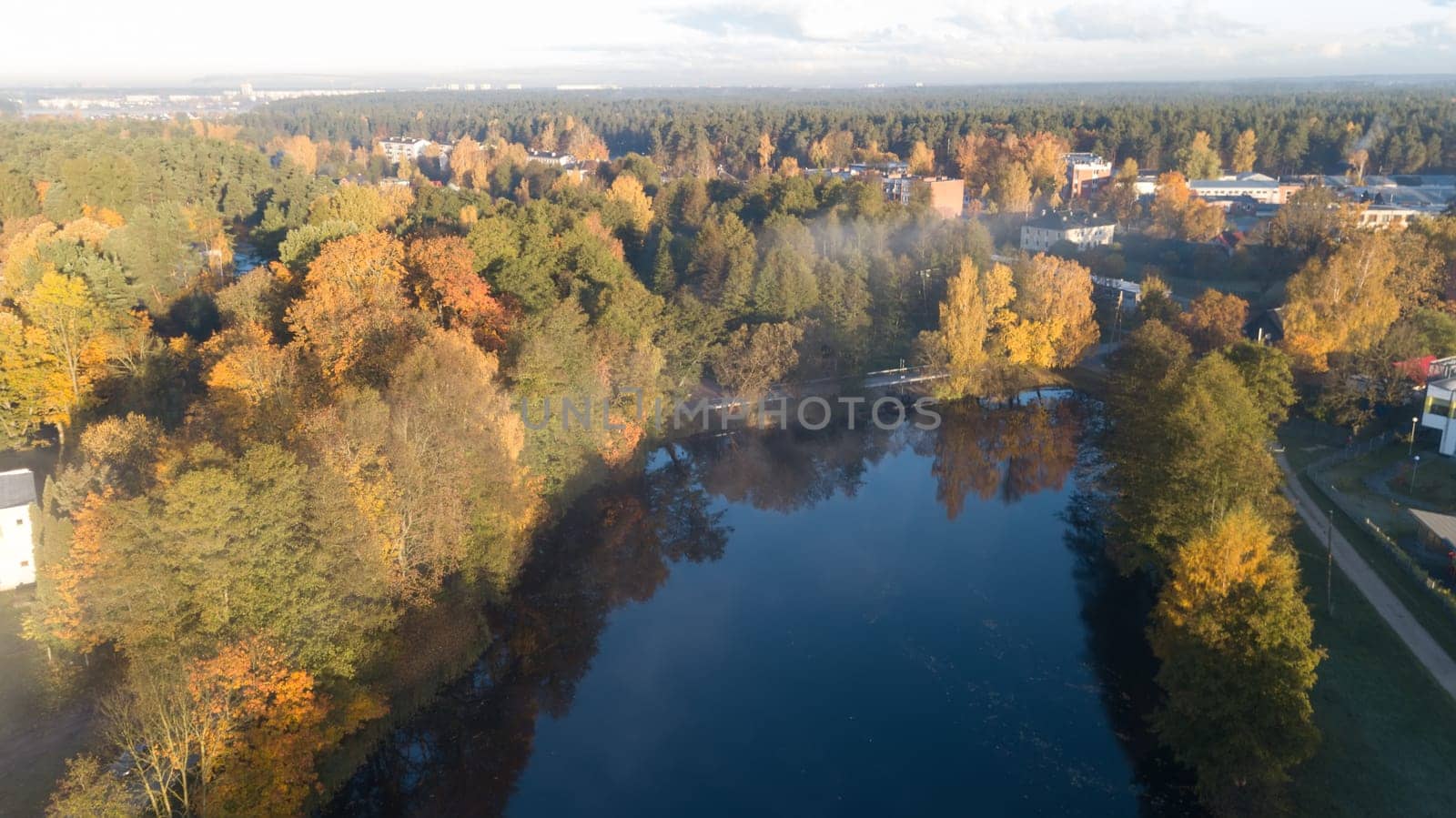 Morning smoke on the water Ulbroka lake Aerial drone top view Latvia