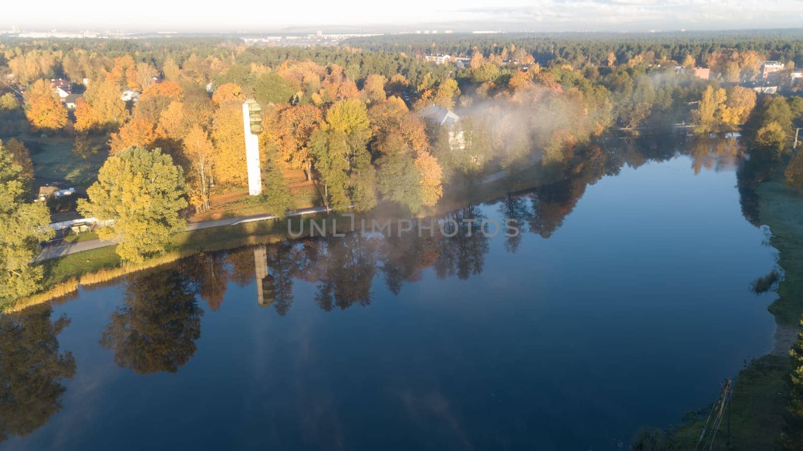 Morning smoke on the water Ulbroka lake Aerial drone top view Latvia