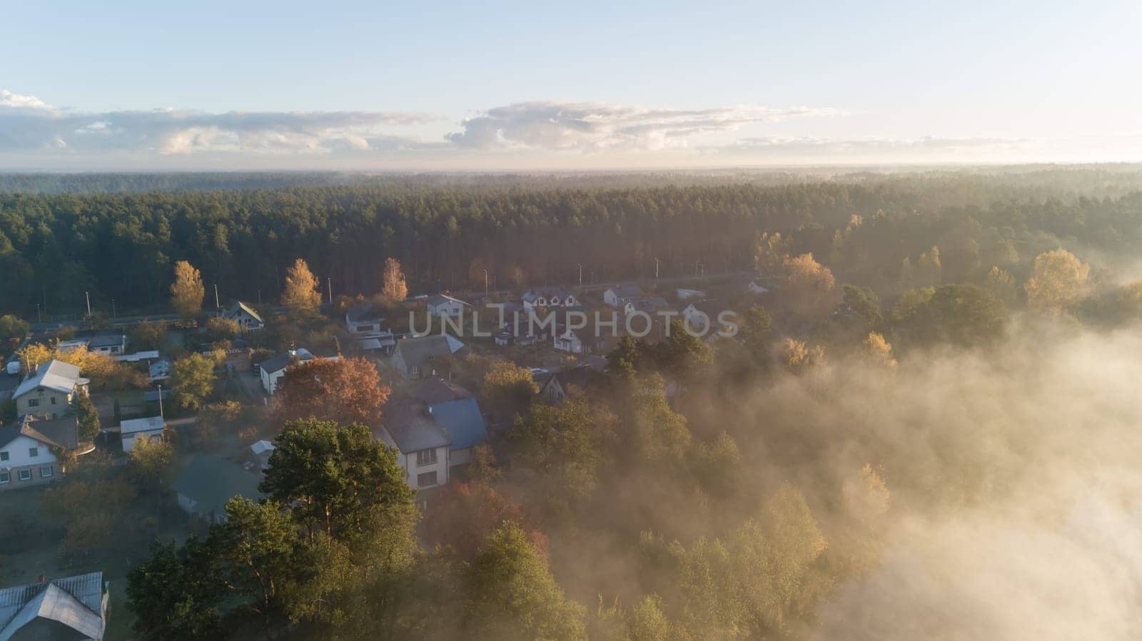 Morning smoke on the water Ulbroka lake Aerial drone top view Latvia