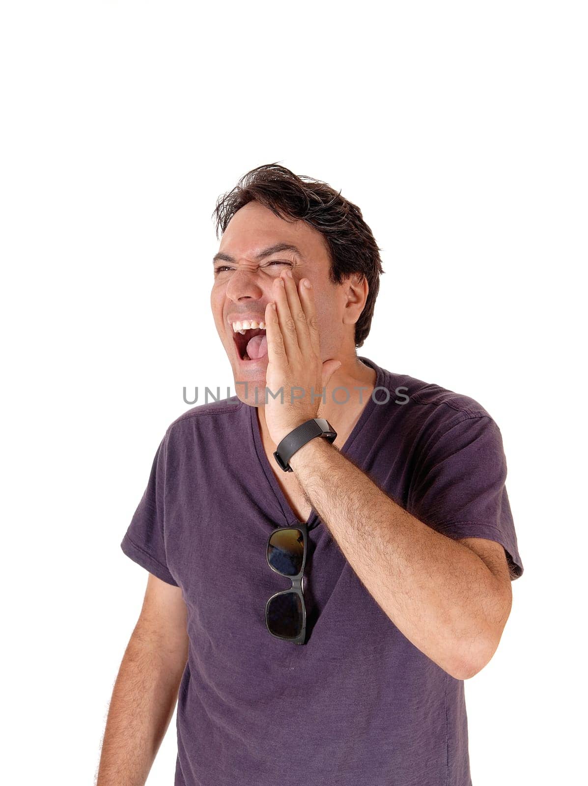 A tall man standing waist up and screaming and holding one hand.on his open mouth, isolated for white background.