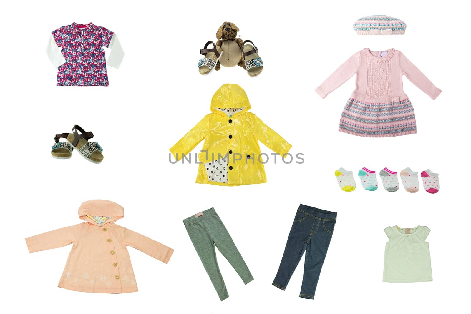 Collage set of children clothes. Concept spring autumn and summer clothes. Isolated on white. Close up.