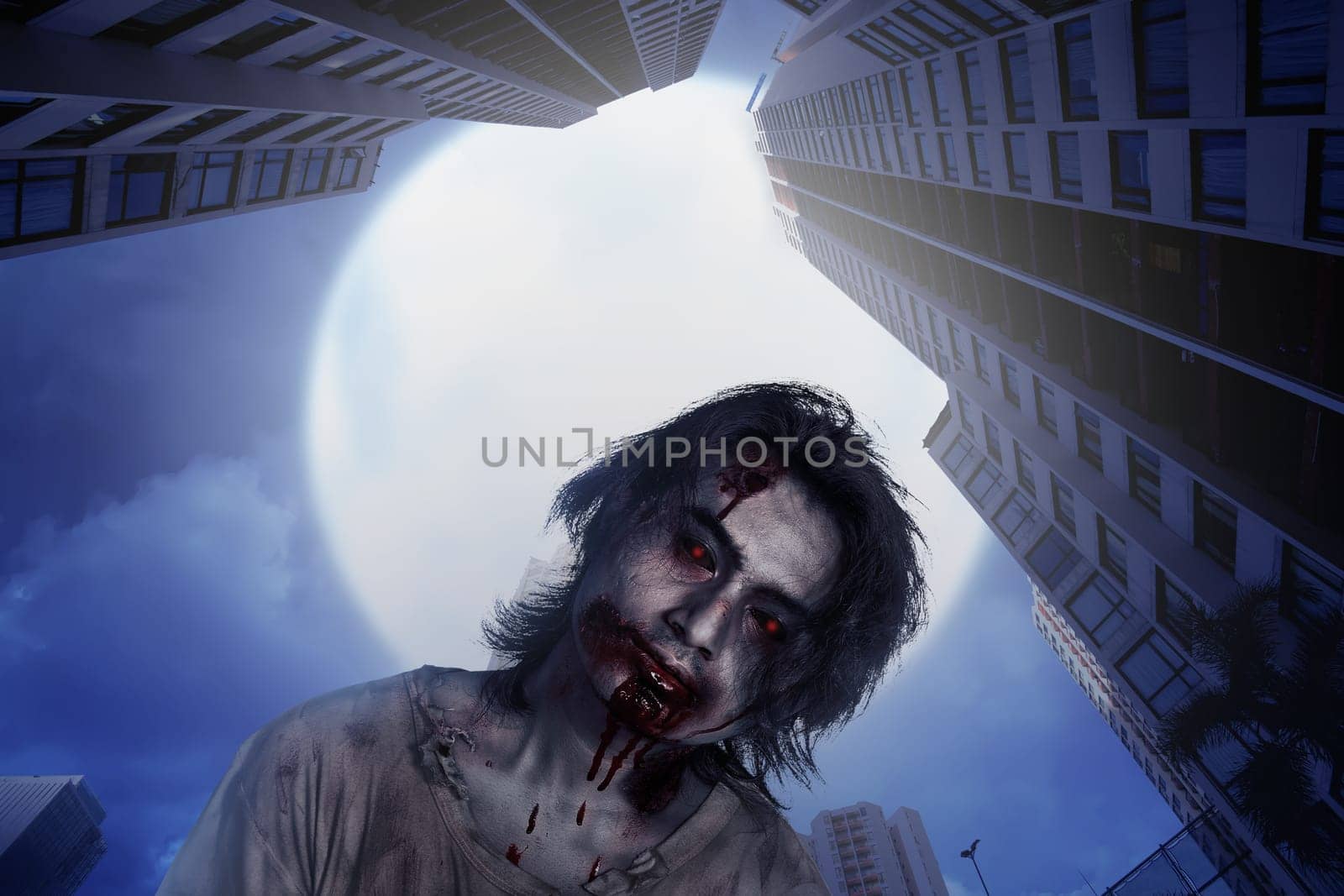 Scary zombie man living on abandoned city. Halloween concept