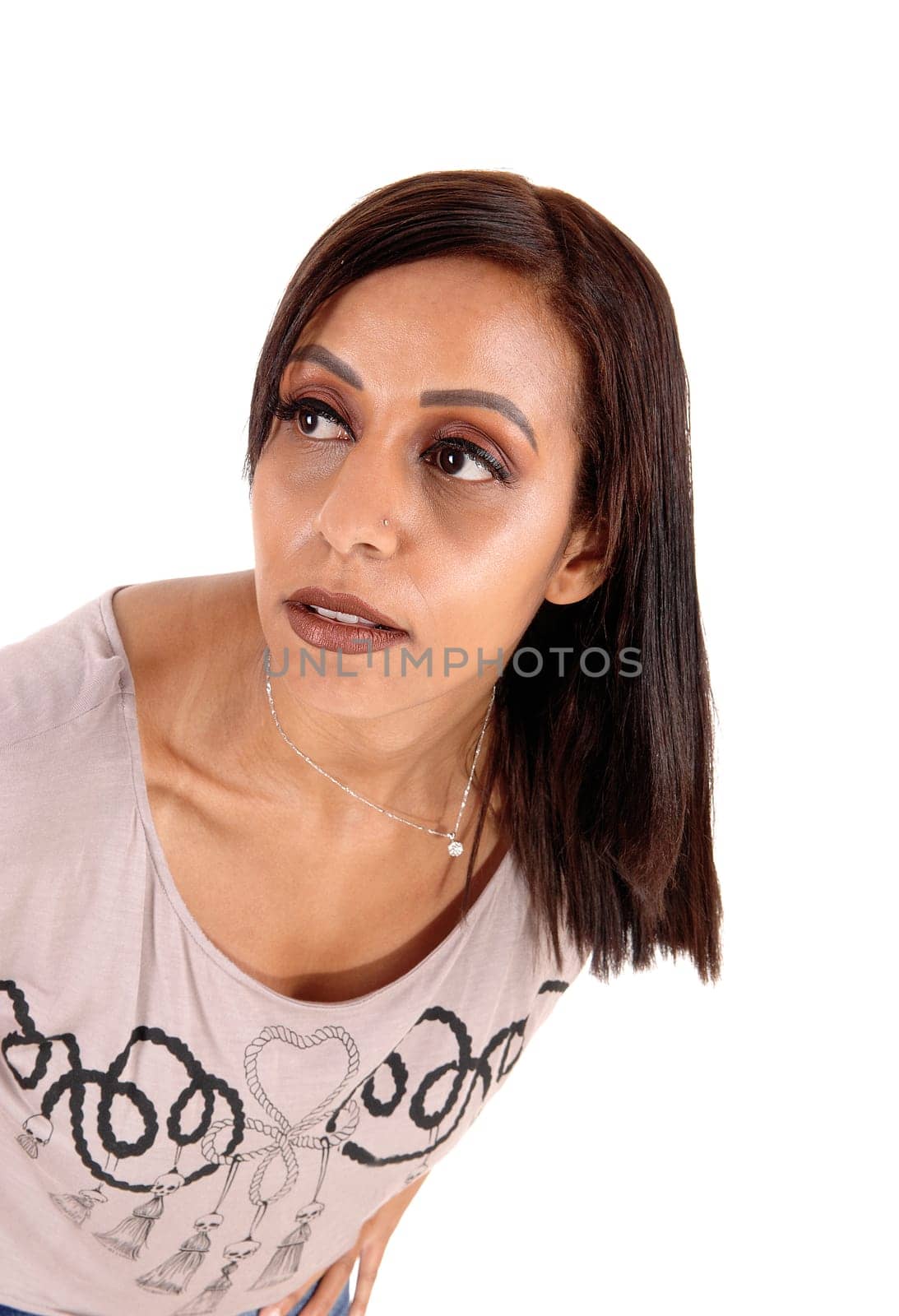 A close up image of a gorgeous young woman looking away with her.big eyes and black hair, isolated for white background.