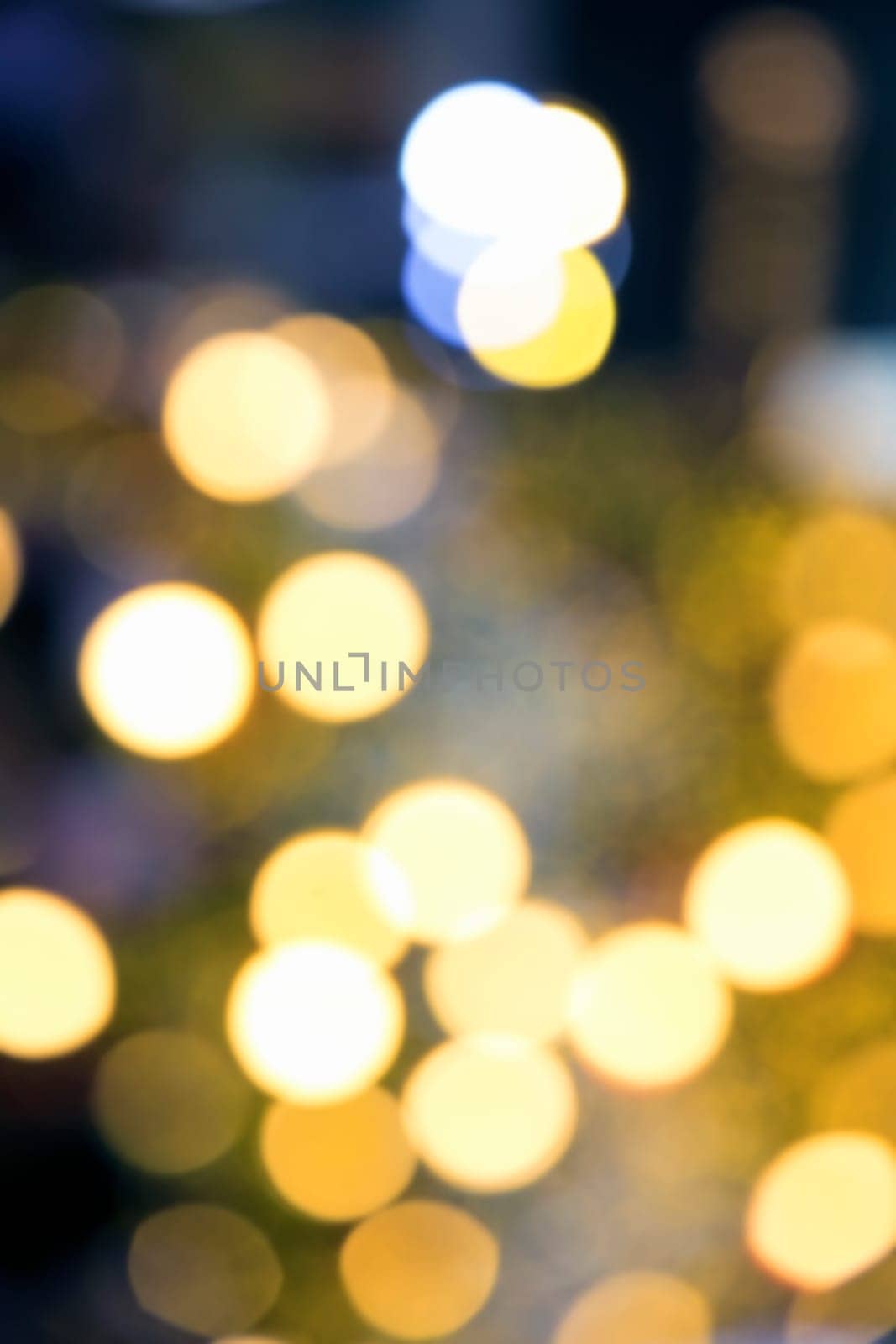 Blurry background image of defocused yellow abstract city street lights at night