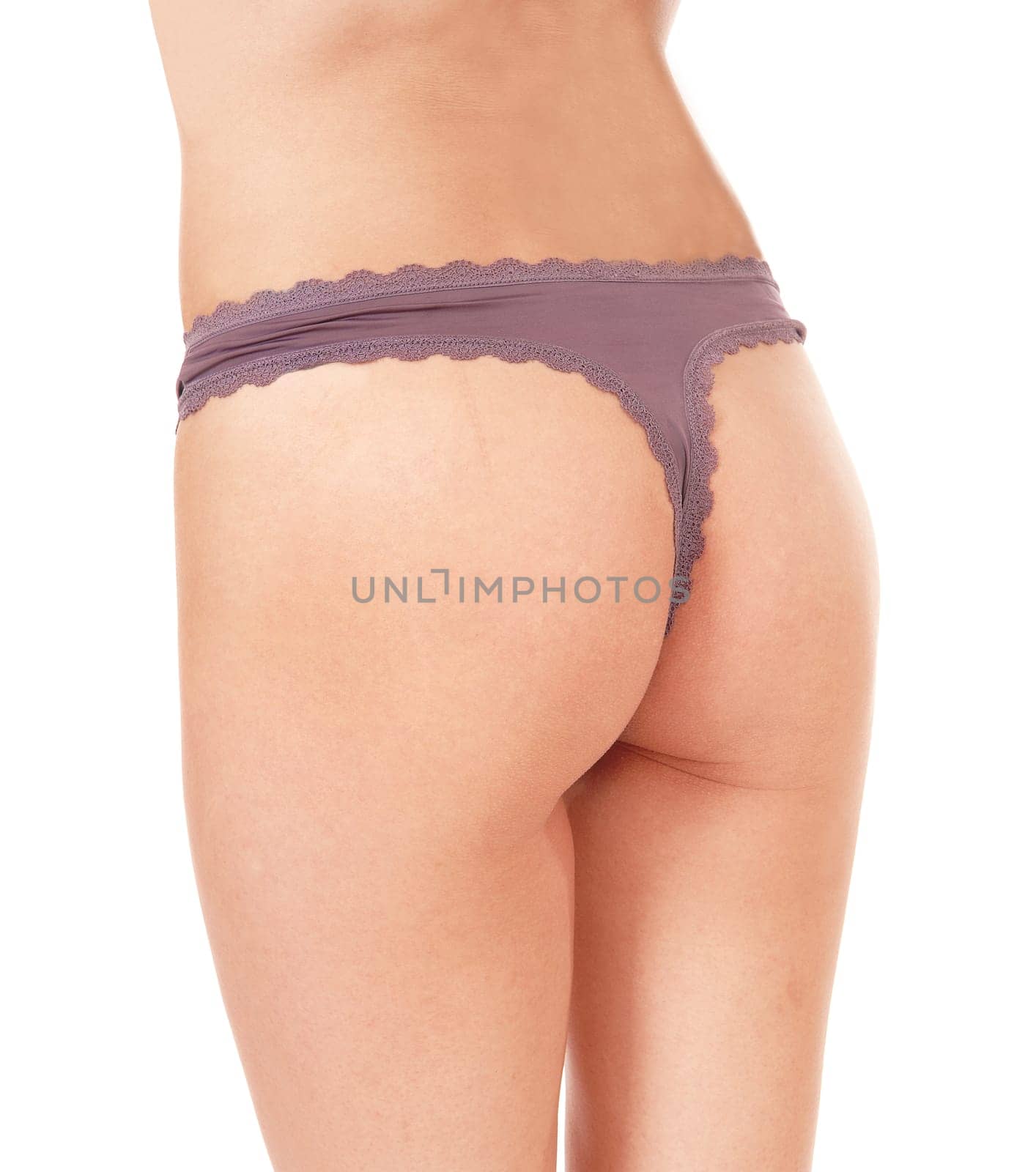 The back site of a beautiful butt wearing a thong standing site warts.with her gorgeous figure, isolated for white background.