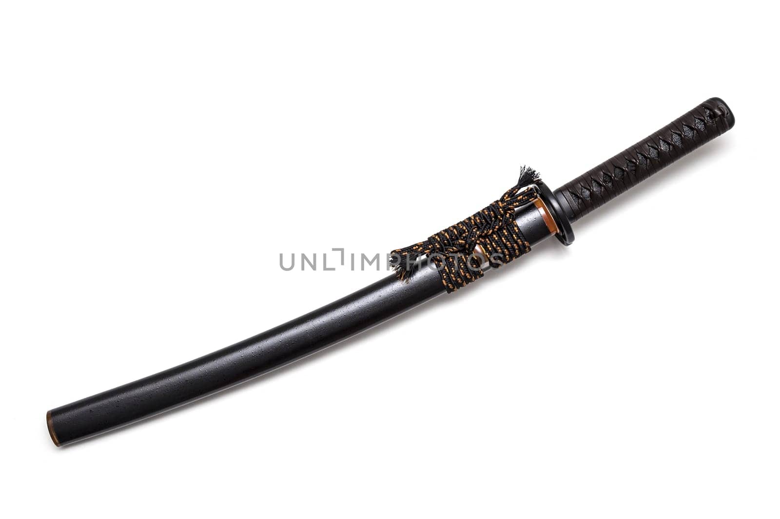 Brown leather cord tie on grip Japanese sword and black scabbard with steel fitting isolated in white background.