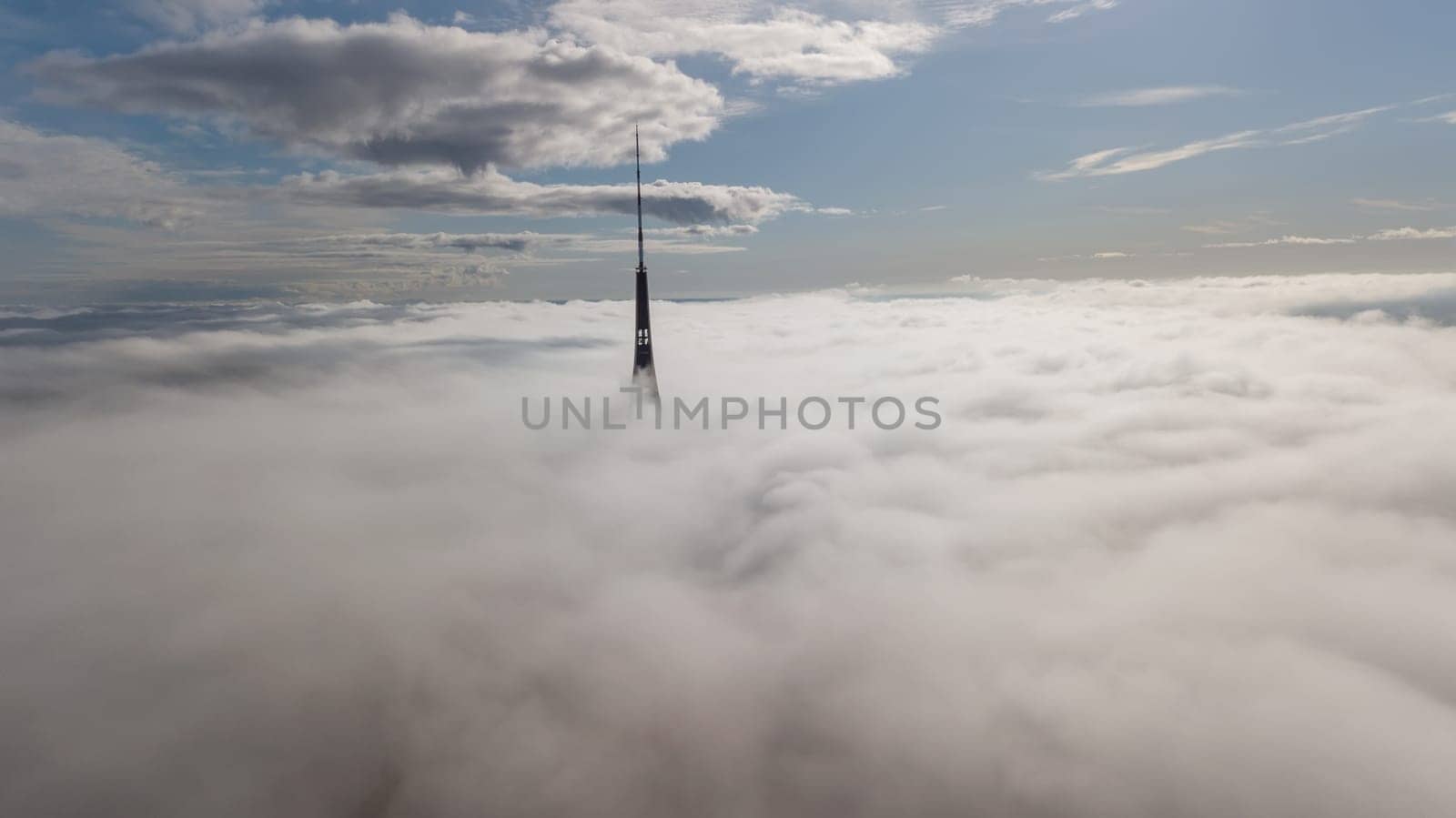 Riga Latvia Tv Tower Zakusala smoke clouds Europe biggest Aerial drone top view