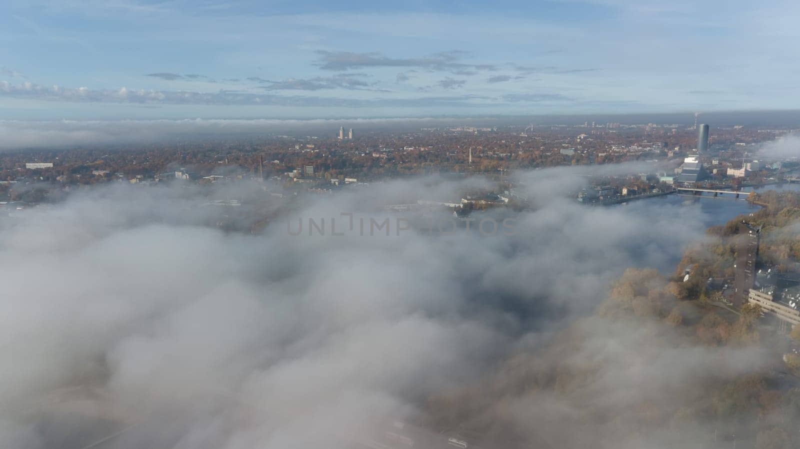 Riga Latvia Daugava river Zakusala island smoke cloud island Aerial drone top view