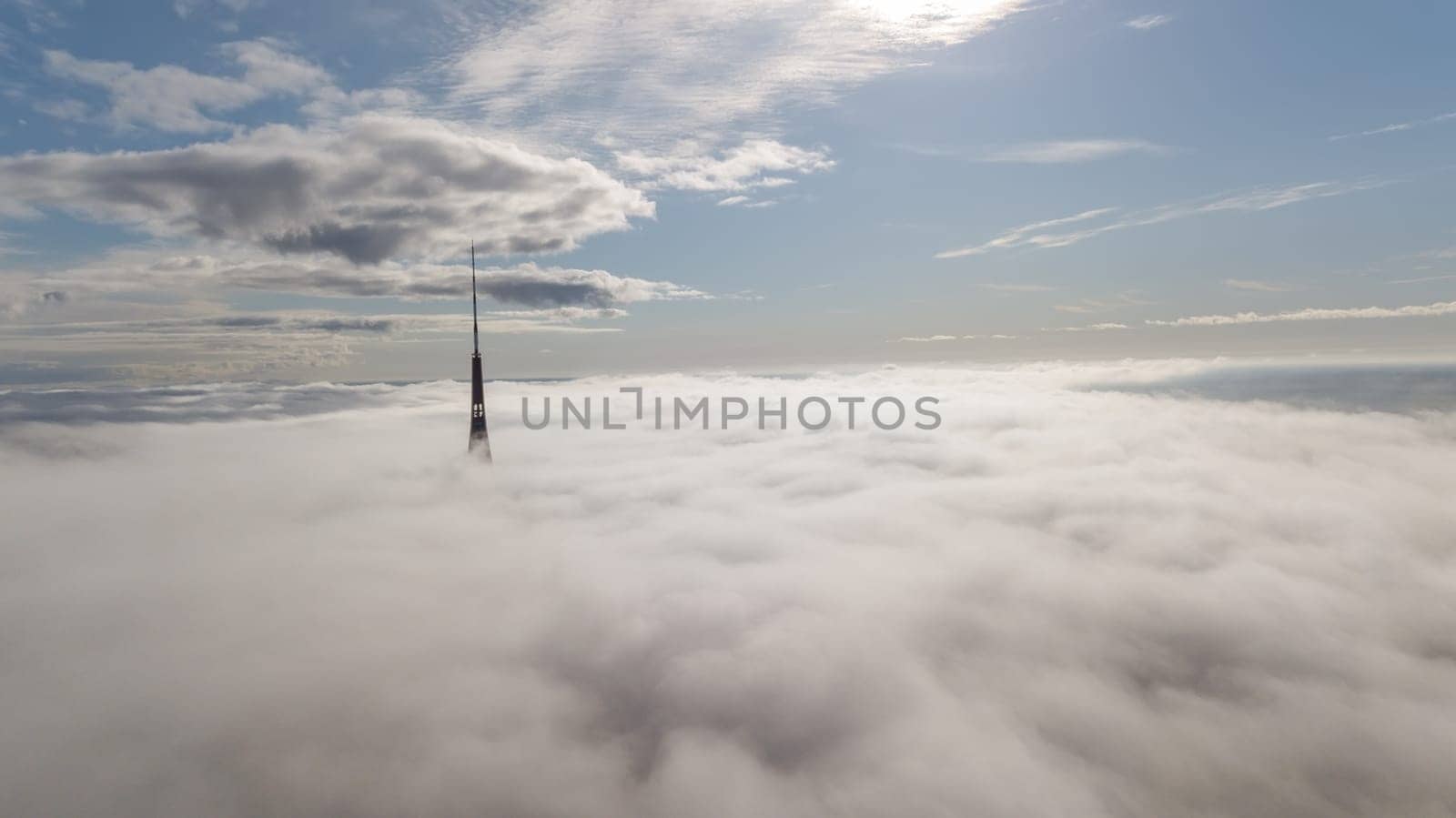 Riga Latvia Tv Tower Zakusala smoke clouds Europe biggest Aerial drone top view