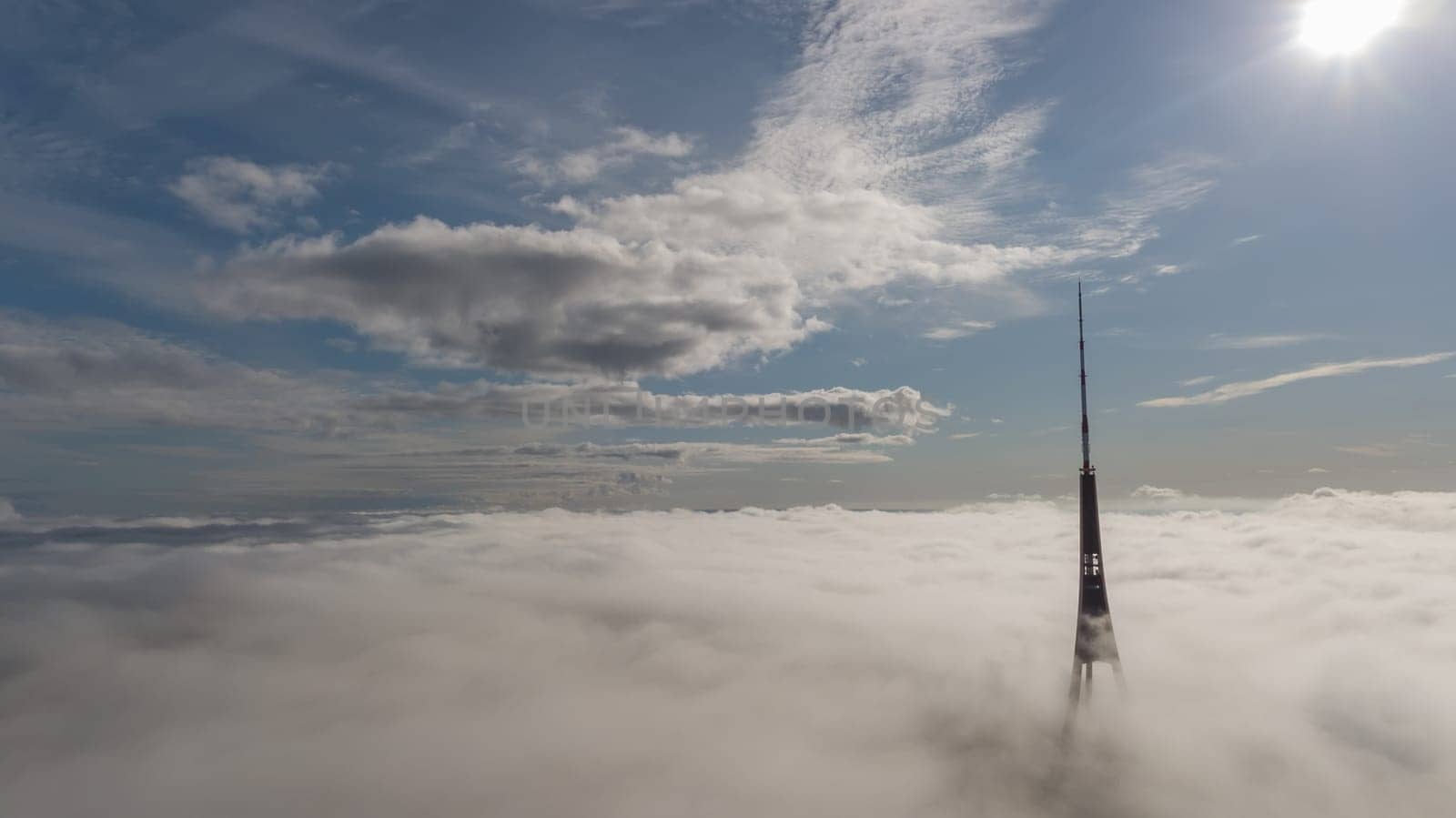 Riga Latvia Tv Tower Zakusala smoke clouds Europe biggest Aerial drone top view