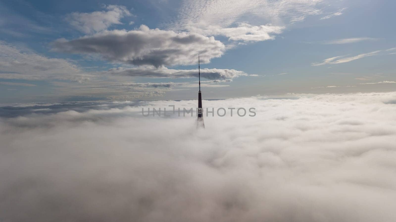 Riga Latvia Tv Tower Zakusala smoke clouds Europe biggest Aerial drone top view