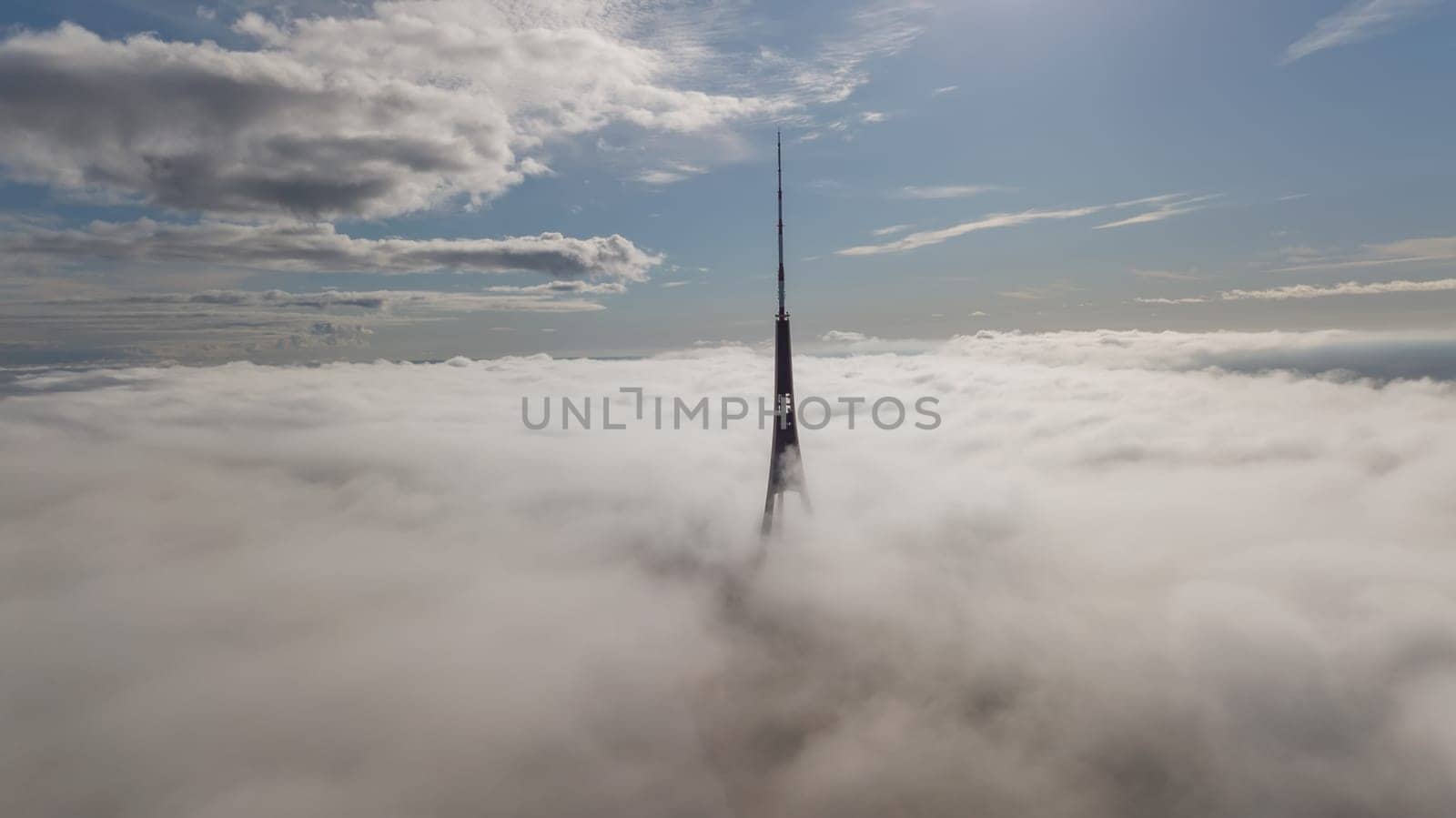 Riga Latvia Tv Tower Zakusala smoke clouds Europe biggest Aerial drone top view