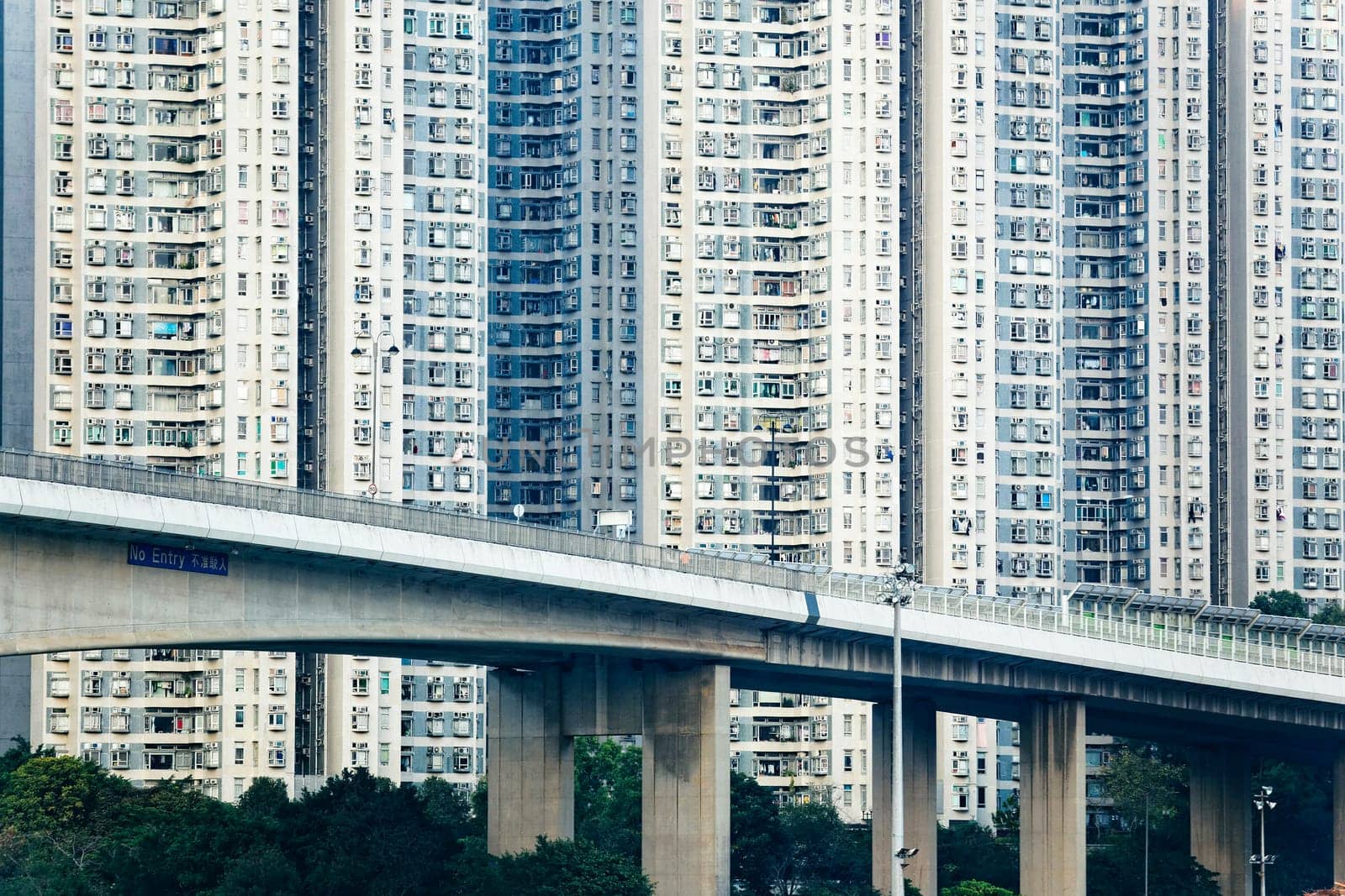 Old apartments in Hong Kong at day and highway