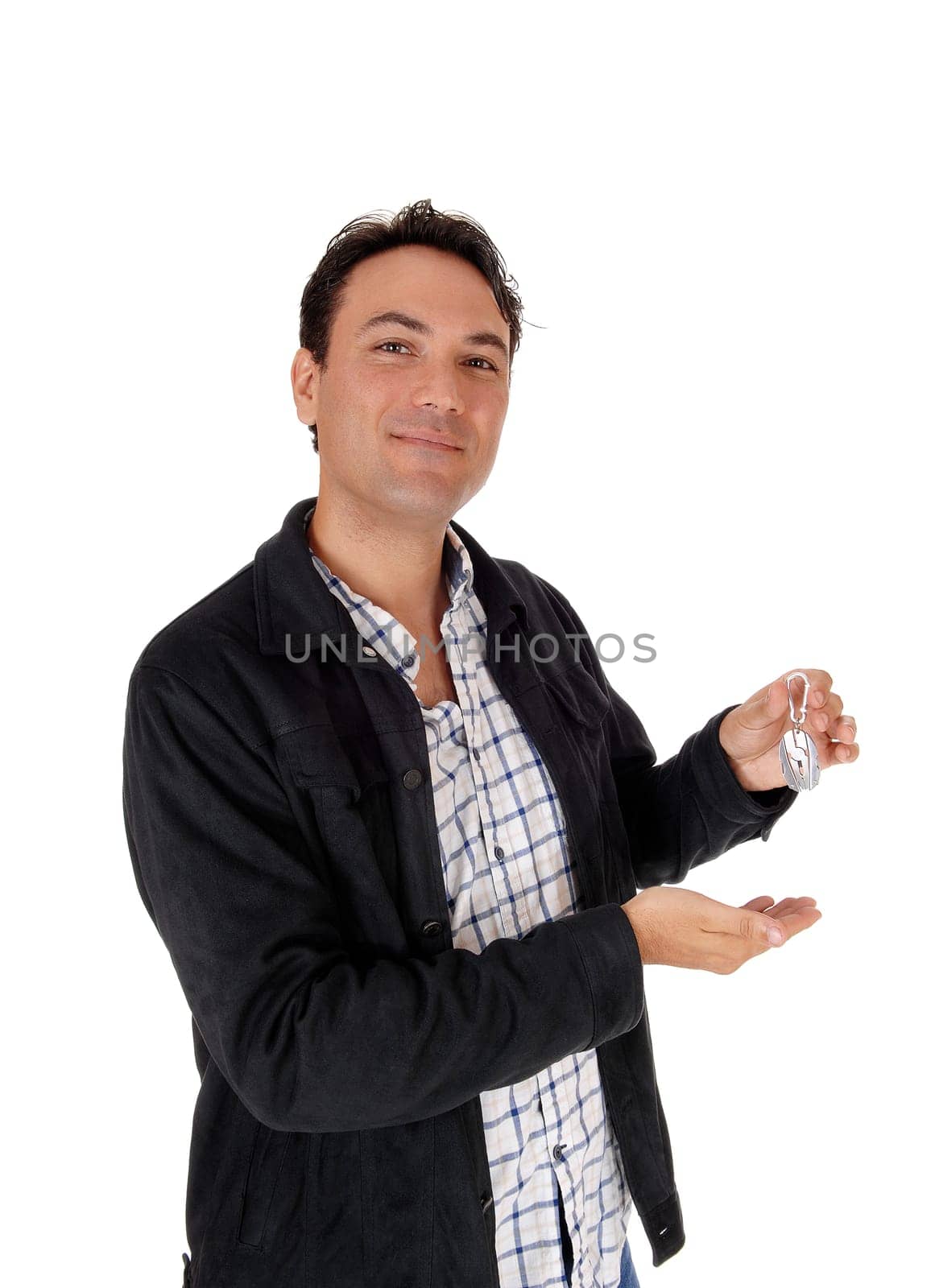 A young man standing in a checkered shirt and black jacket holding.miniature tools, isolated for white background.