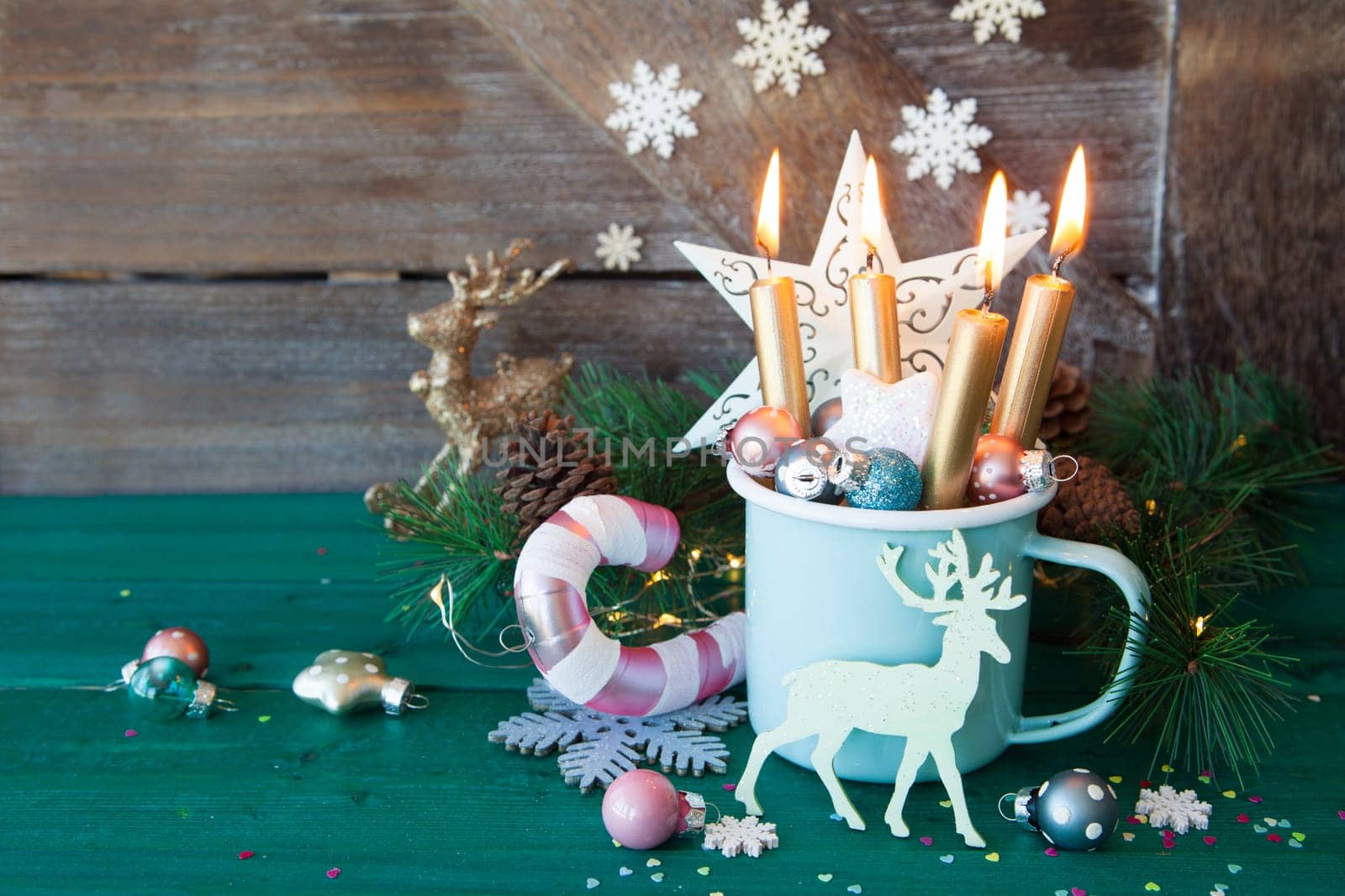 Rustic mug with colorful festive decorations for a merry christmas
