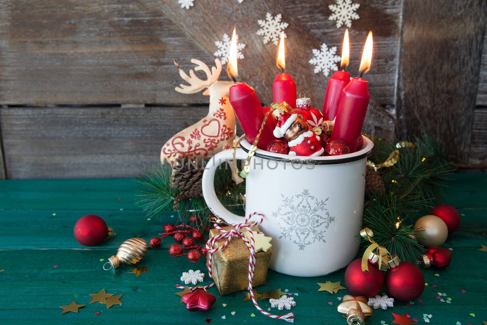 Rustic mug with colorful festive decorations for a merry christmas