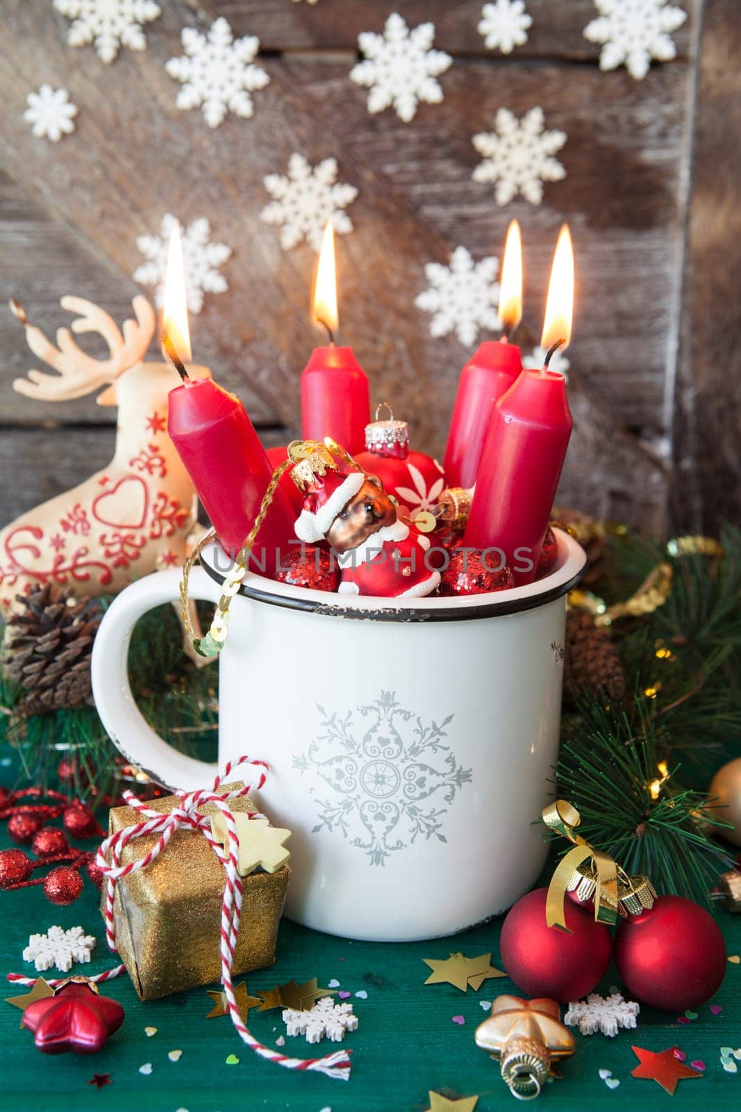 Rustic mug with colorful festive decorations for a merry christmas