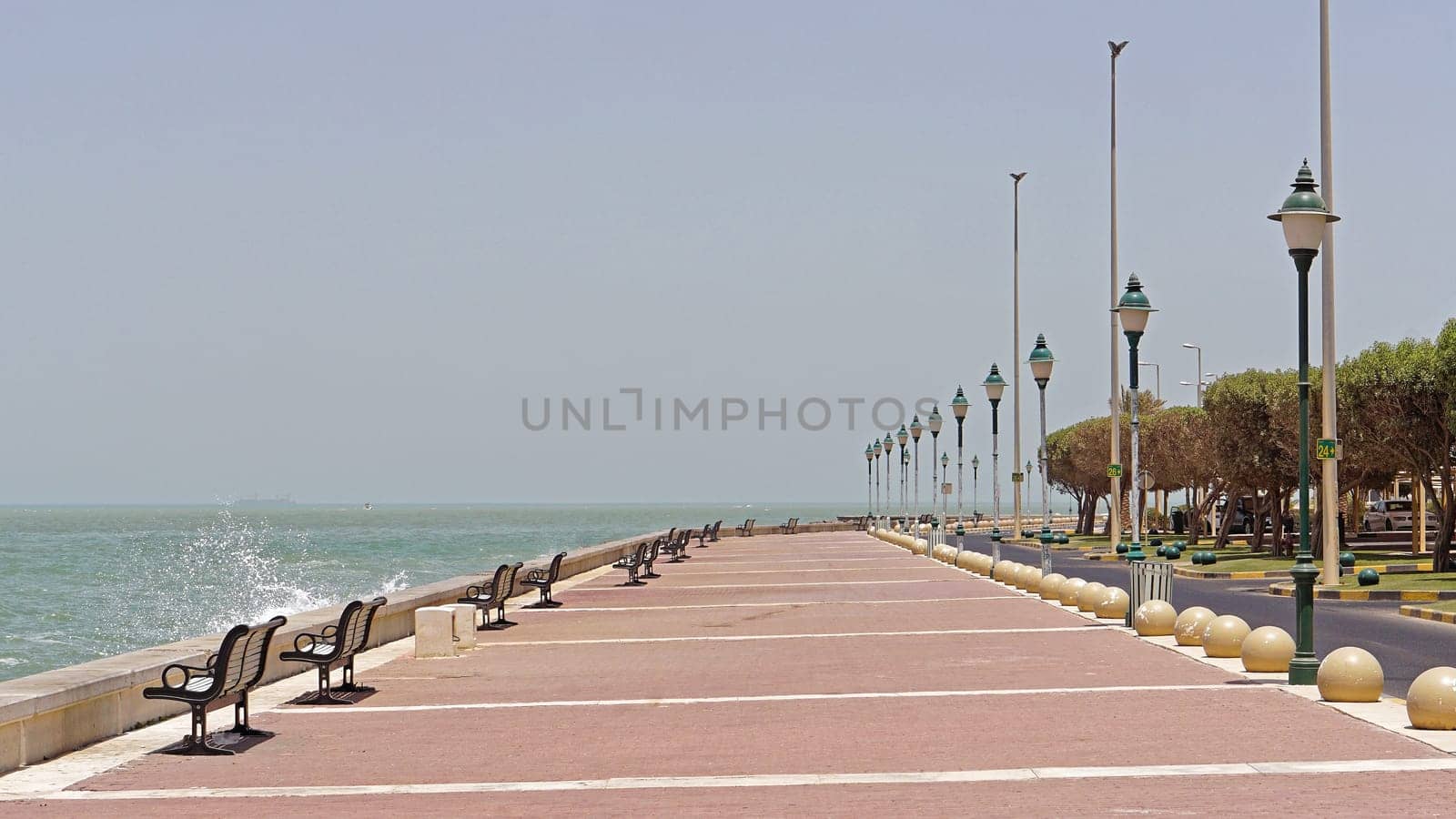 Empty coast walk promenade during day in Kuwait