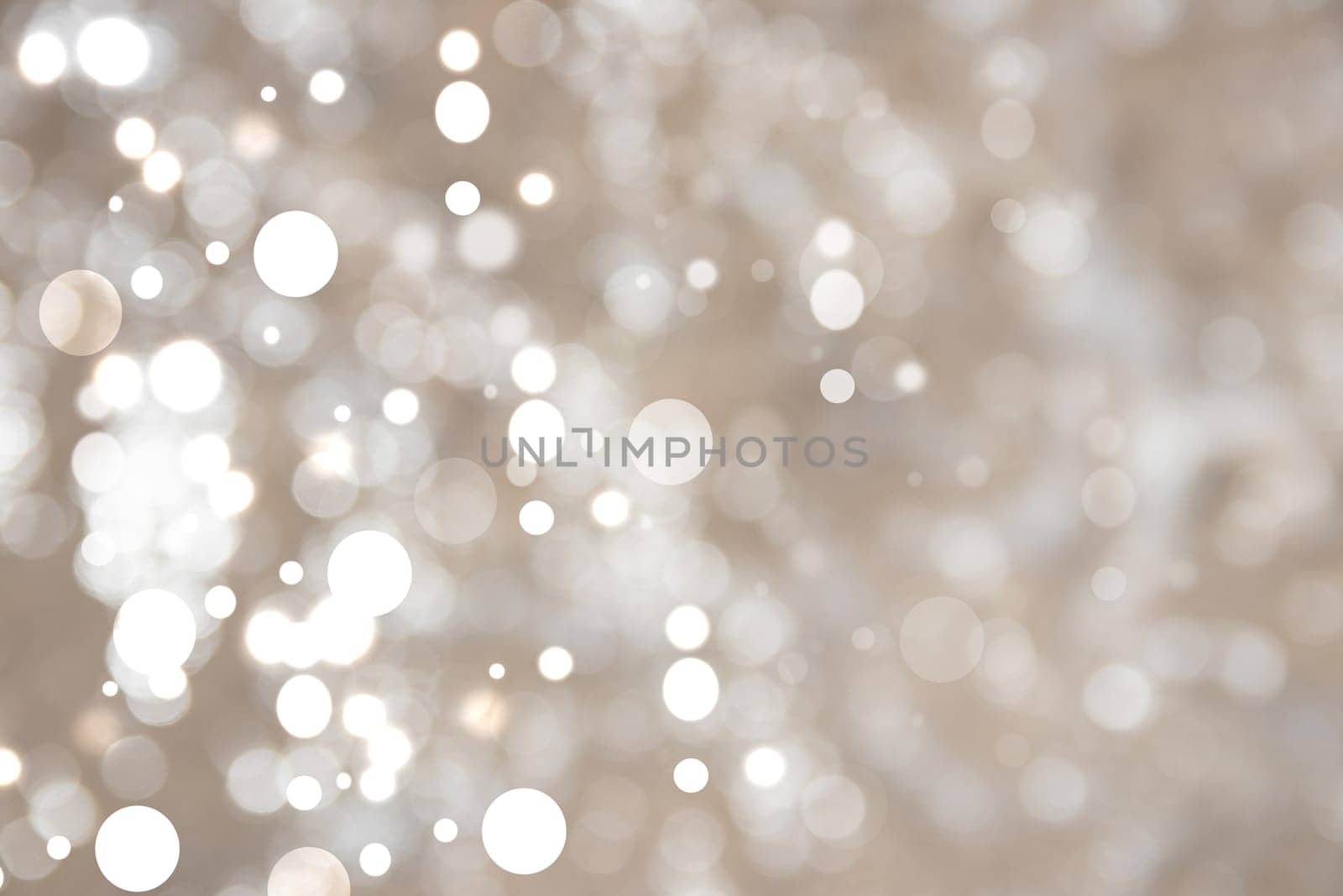 Festive brown silver bright abstract Bokeh with white circles. Template for your product display montage. Beautiful texture.