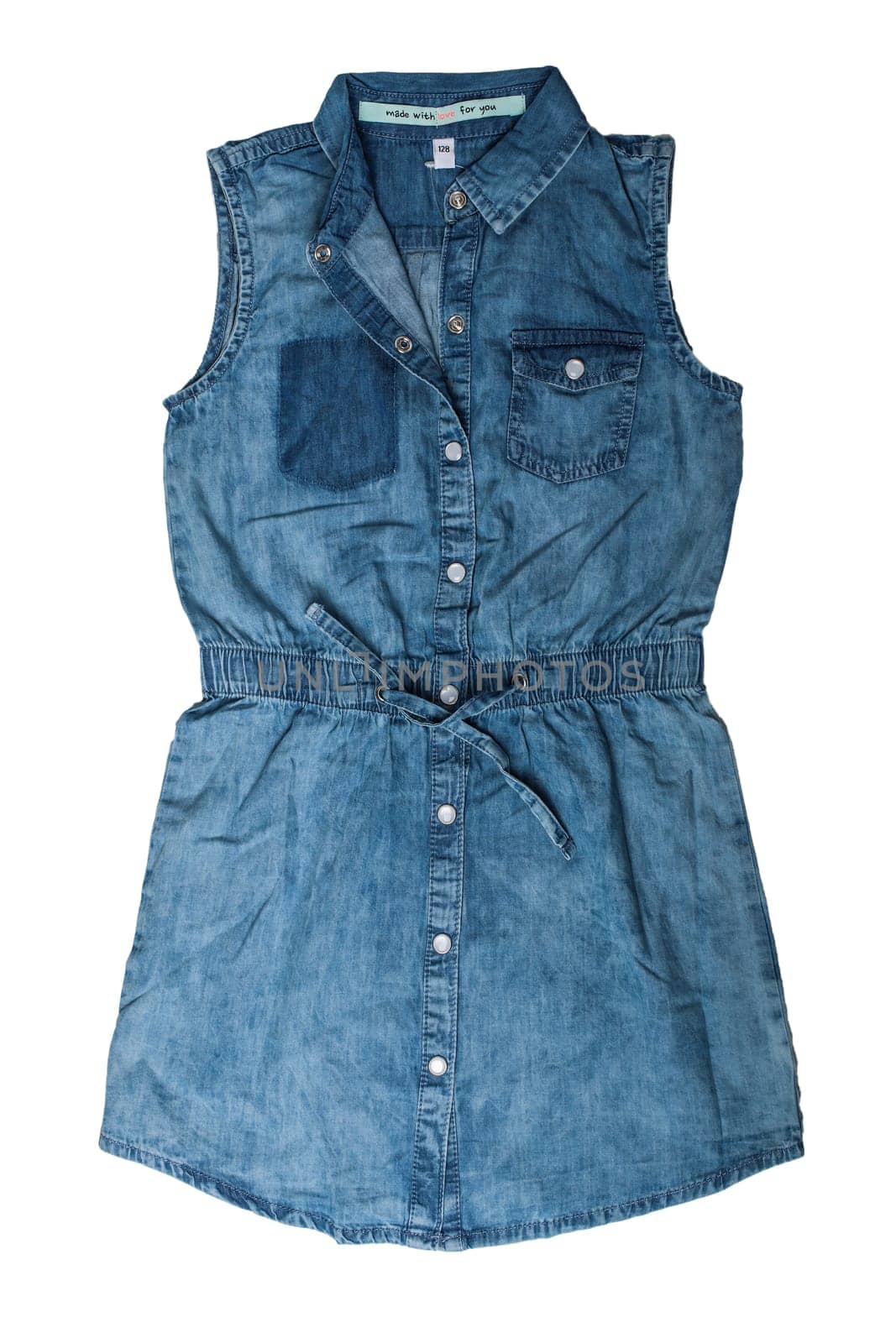 Children clothes. Sleeveless blue jeans dress for child girl isolated on a white background. Jeans fashion.
