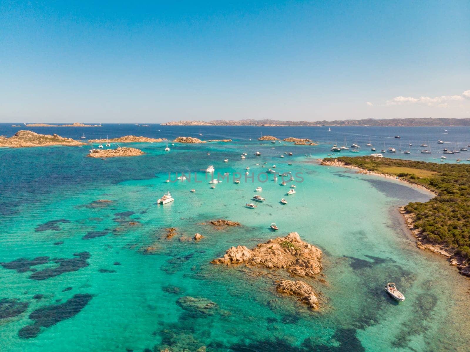 Drone aerial view of Razzoli, Santa Maria and Budelli islands in Maddalena Archipelago, Sardinia, Italy. Maddalena Archipelago is a group of islands between Corsica and north-eastern Sardinia.