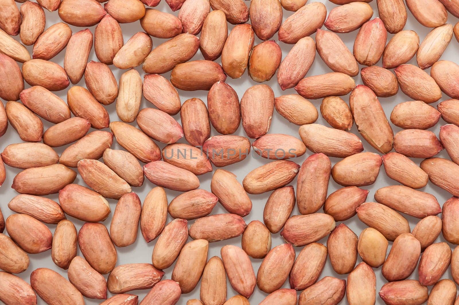 peanuts peeled and isolated on white background