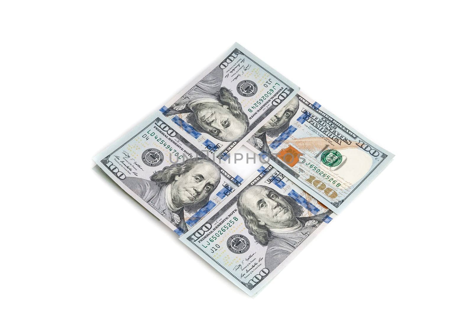 One hundred American dollars stacked in a square on a white background.
