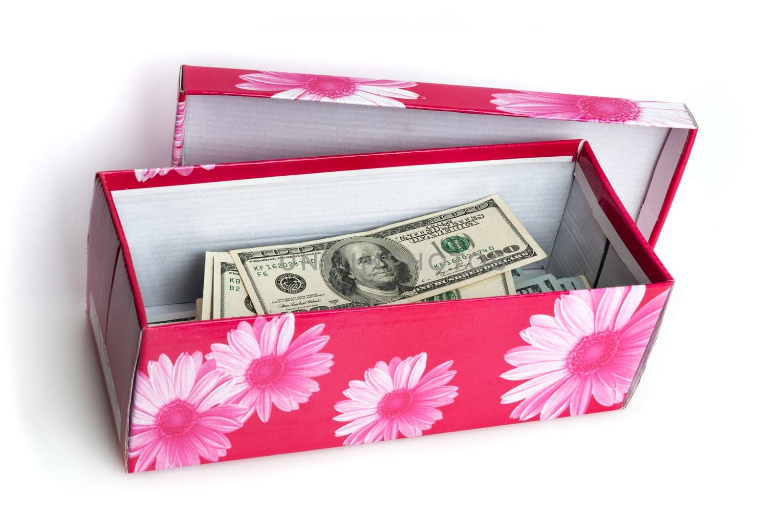 In the red box stacked in the form of a bundle of bills of one hundred US dollars.