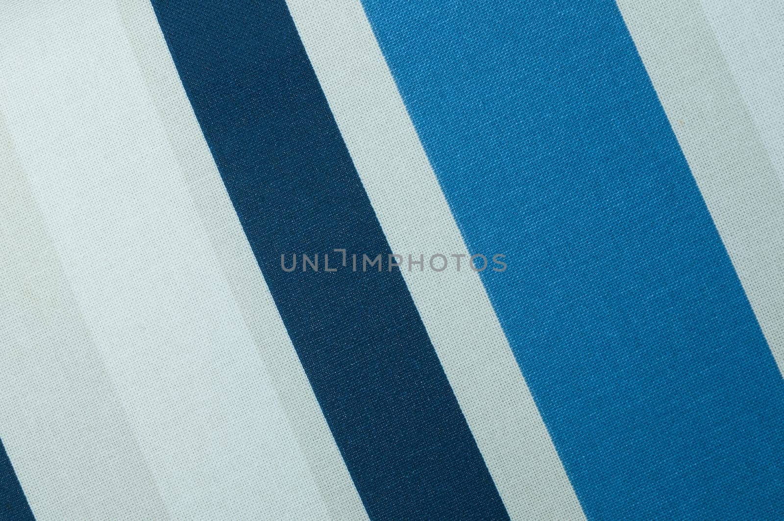 Textured with a pattern of diagonal strips of white and shades of blue