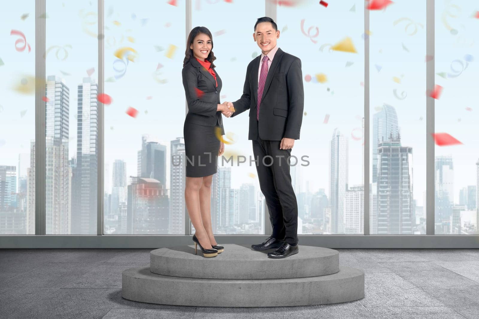 Business people shaking hands on the office room. Business concept