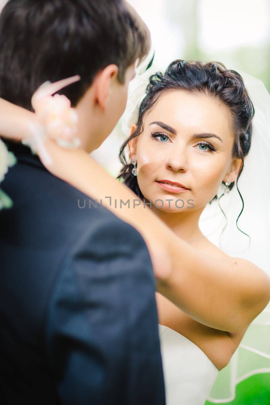 beautiful young couple stand on the balcony
