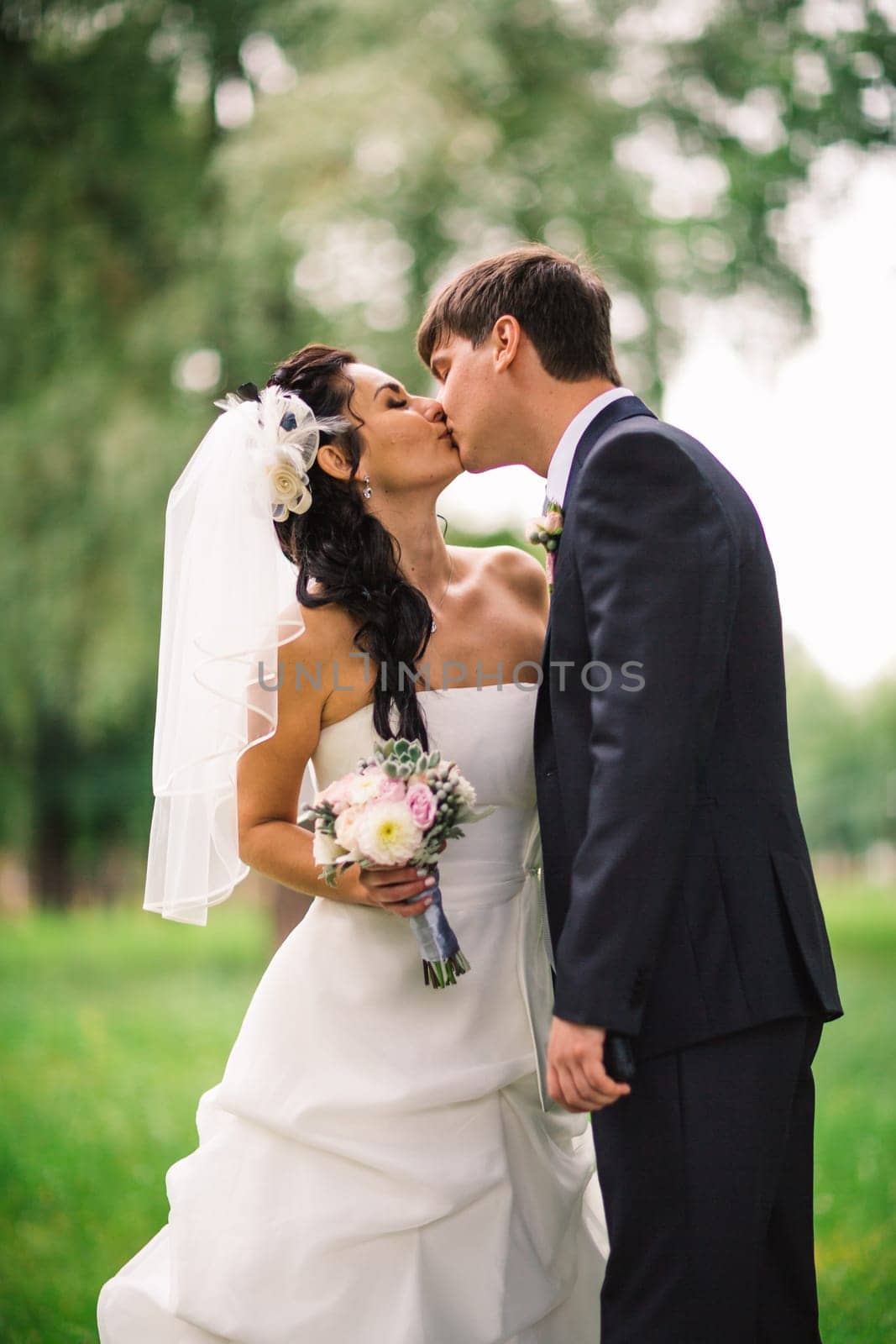 beautiful young couple stand on the balcony