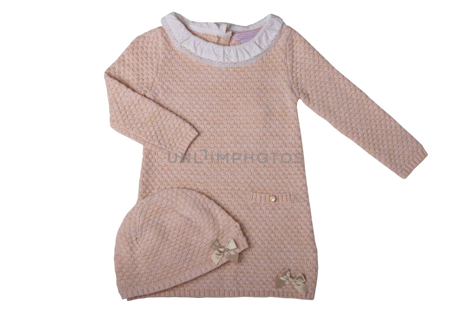 Clothes for children. Pink baby girl dress with white lace collar and matching hat isolated on a white background. Children fashion.
