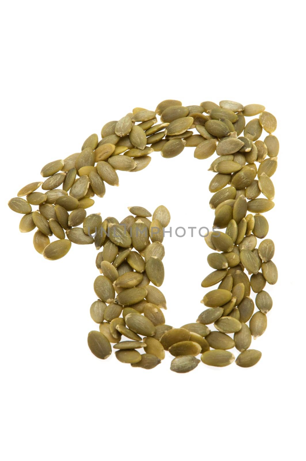 Sunflower seeds in the center, in the shape of a circle, on a white background.