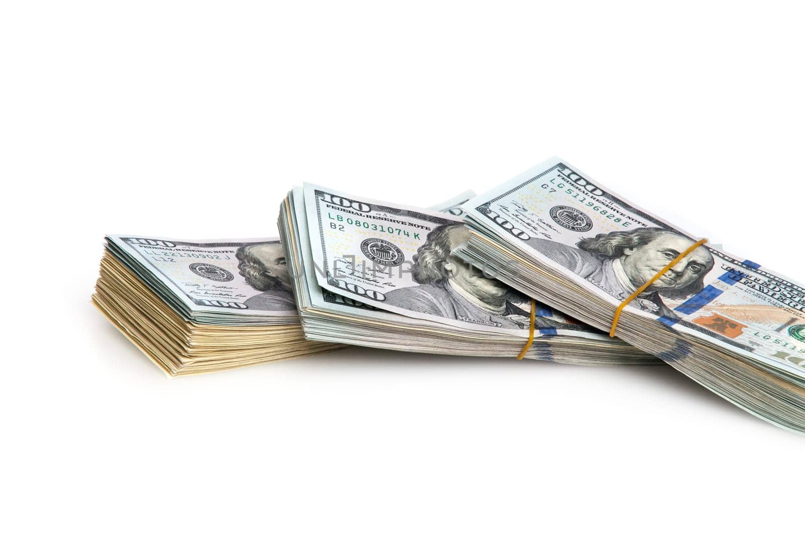 Thirty thousand American dollars in packs stretched elastic. On a white background.