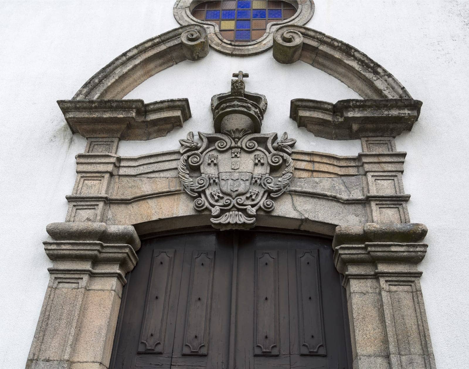 Detail of the portal of the main facade of the Baroque Church of Mercy in the historic town of Trancoso, Portugal