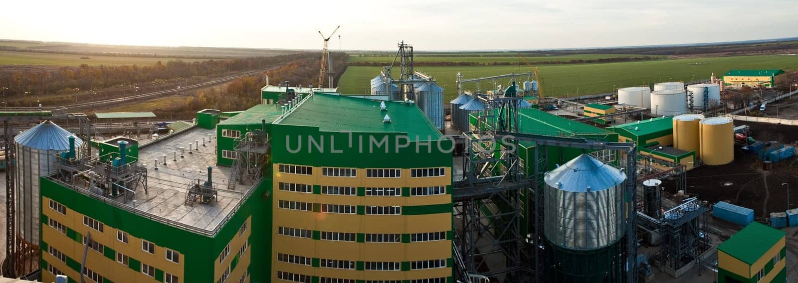Towers of grain drying enterprise. metal grain facility with silos