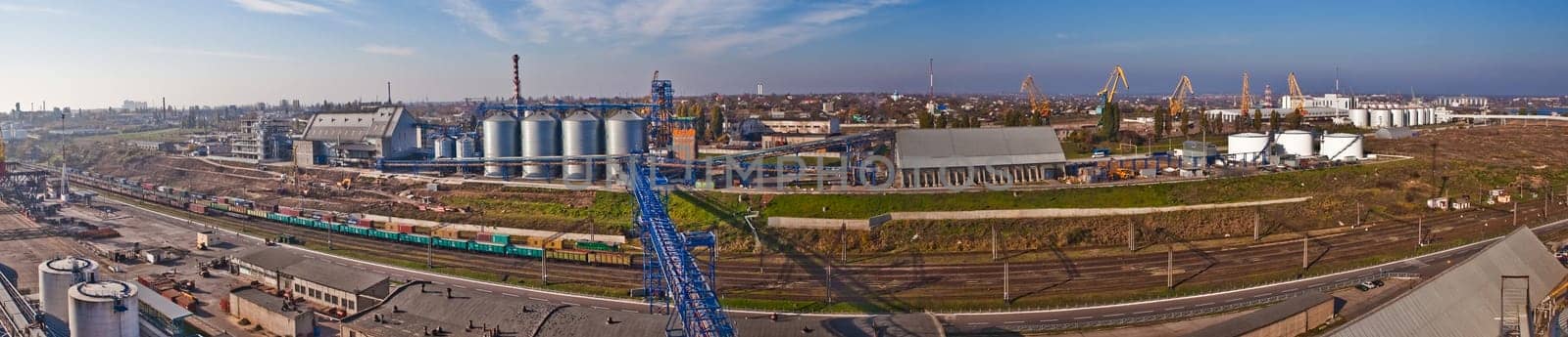Towers of grain drying enterprise. metal grain facility with silos