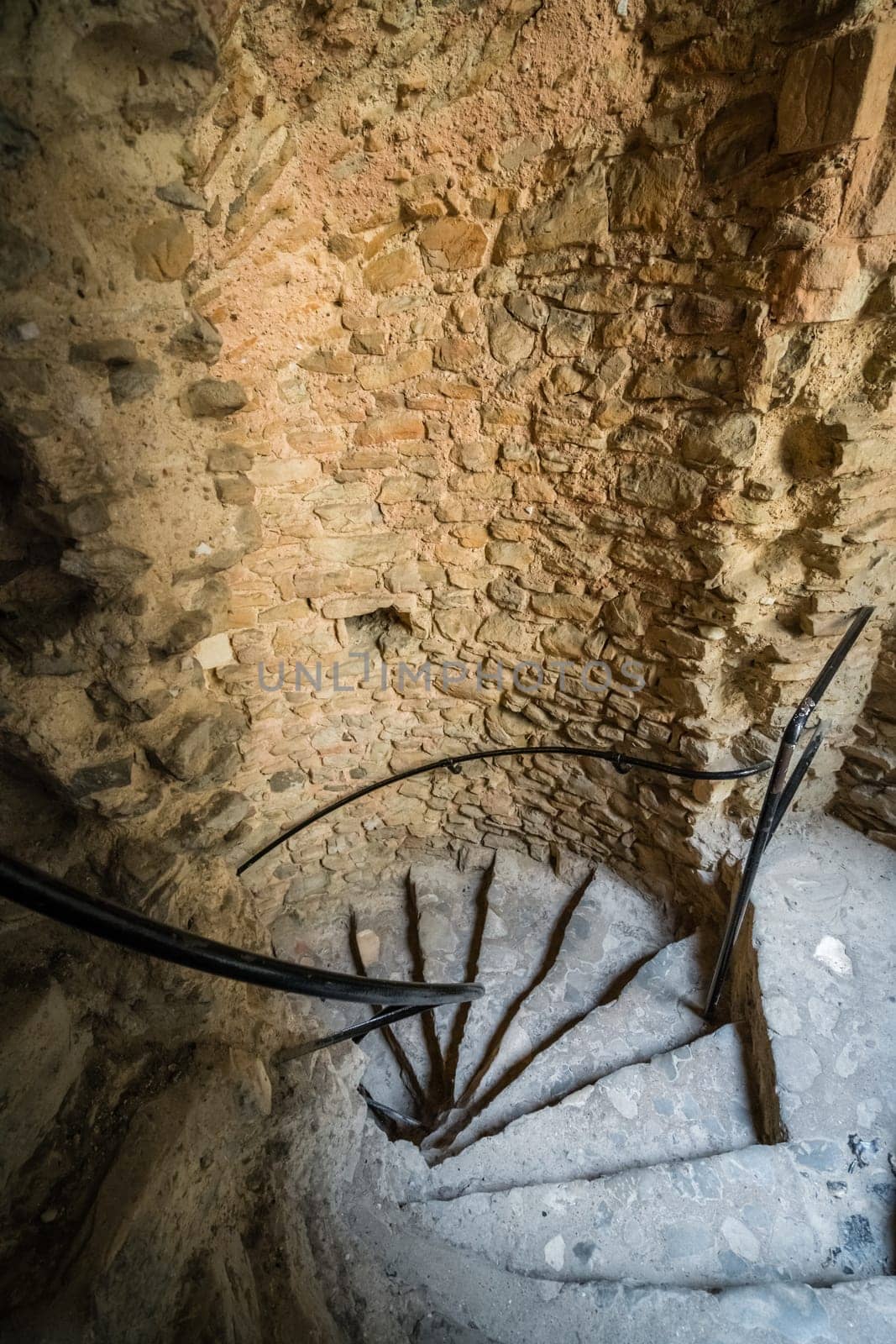 Winding stairs to the top of the tower inside the ruins of the 12th-century Rochester Castle, Kent, South East England