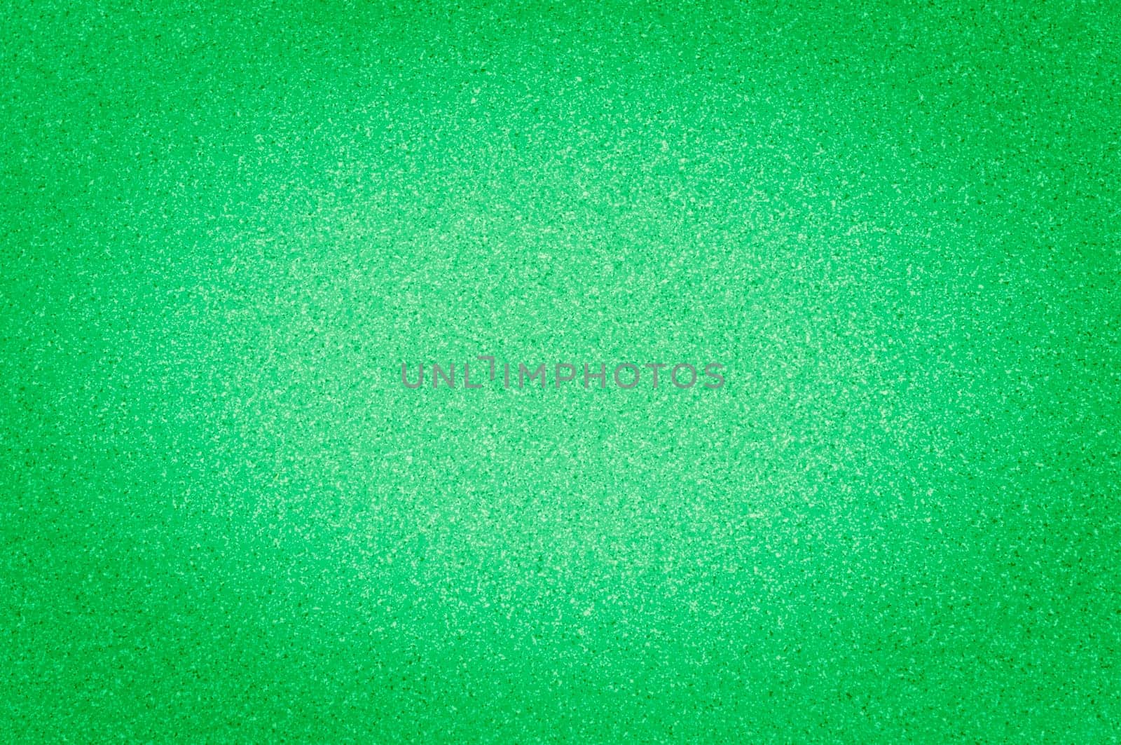 The granite texture is a bright green color with small dots, with vignetting.