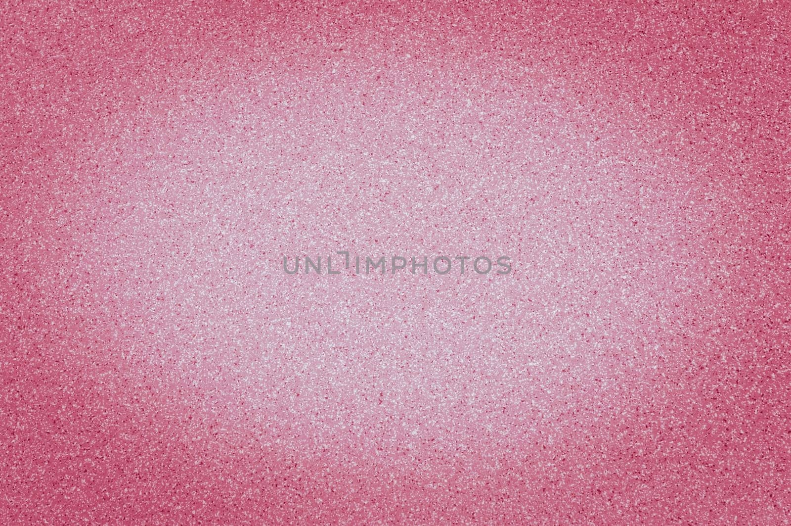 Texture of granite of red color with small dots, with vignetting.