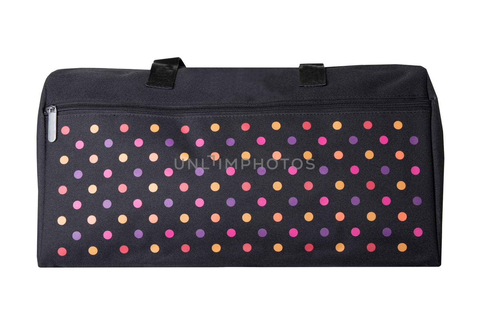 Bags fashion. Closeup of multicolored dotted overnight bag on a white background. Travel concept.