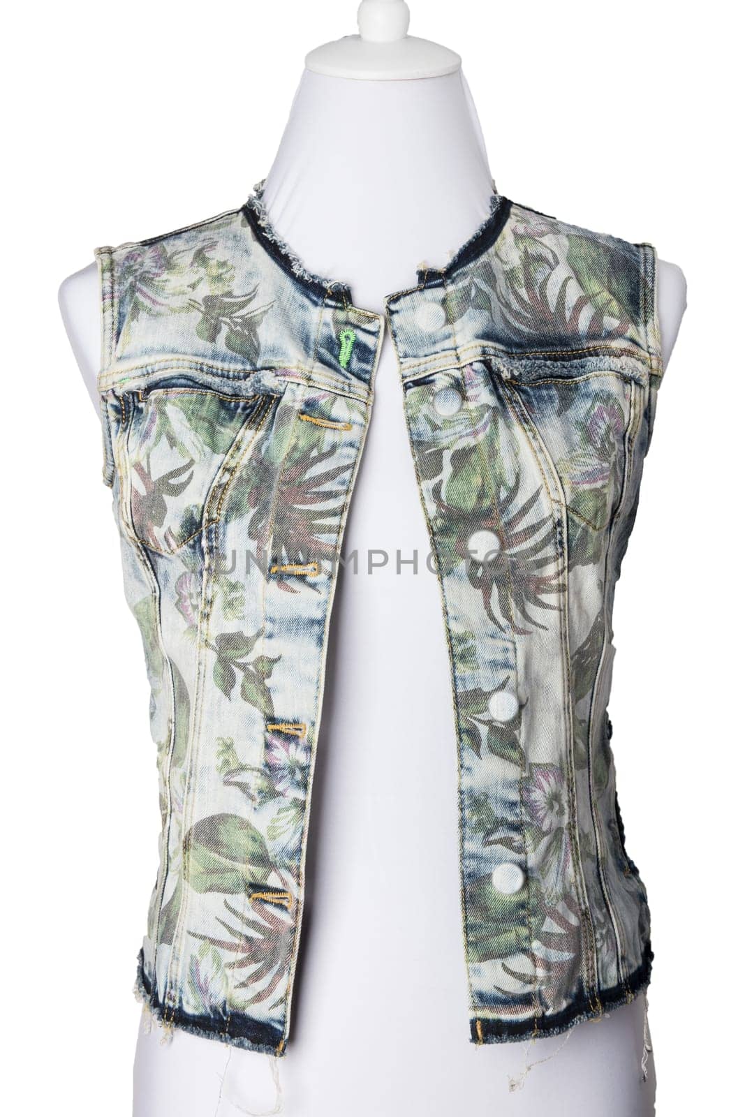Women clothes. Sleeveless blue jeans vest or jacket for woman on mannequin  isolated on a white background. Jeans fashion.