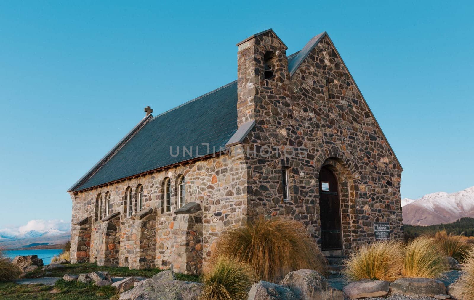 Historic Church Of the Good Shepherd on Lake Tekapo in New Zealand in late afternoon, just prior to sunset